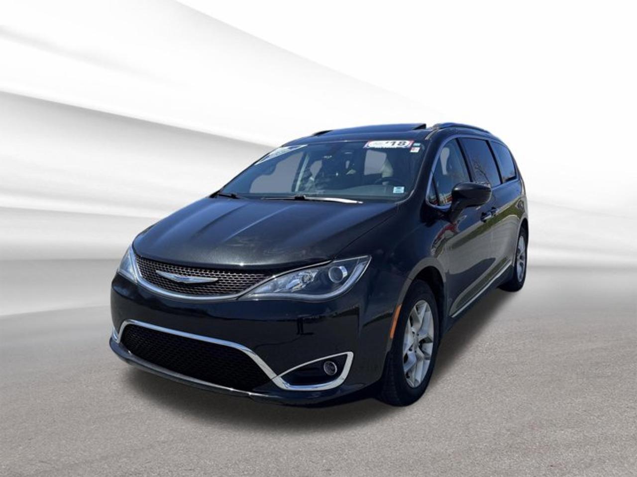 Meet the 2018 Chrysler Pacifica Touring-L Plus, a used minivan that fits busy family life with ease. Offered by Steele Halifax Chrysler Dodge Jeep Ram FIAT in Halifax, this front-wheel drive model pairs a proven 3.6-litre V-6 gas engine with an automatic transmission for smooth daily driving. Finished in Black with a Black interior, it has 106,620 km and a smart mix of comfort, space, and everyday value.The 2018 Chrysler Pacifica Touring-L Plus stands out with a clean, modern look and practical four-door access. Its panoramic sunroof adds an open, airy feel to the cabin, while the included power outlet helps keep devices ready on the go. A spare tire adds peace of mind for longer trips around Nova Scotia and beyond.FEATURES OF THE Pacifica Touring-L PlusSmooth 3.6-litre V-6 family performancePanoramic sunroof adds open cabin feelFront-wheel drive for everyday confidenceAutomatic transmission supports easy commutingADVANCED SAFETY FEATURESFour-door design supports easy family accessSpare tire included for roadside confidenceFront-wheel drive aids steady road mannersStrong body design helps protect occupantsPERFORMANCE AND EFFICIENCY3.6-litre V-6 delivers smooth powerAutomatic transmission shifts with refined easeFront-wheel drive suits daily Canadian roadsGas engine supports practical long tripsCOMFORT AND CONVENIENCEPanoramic sunroof brightens every driveBlack cabin offers clean, timeless stylePower outlet helps charge devicesFour doors simplify passenger entryTECHNOLOGY AND CONNECTIVITYPower outlet supports mobile device chargingEasy automatic driving in city trafficUseful controls designed for daily usePractical layout helps reduce driver stressCARGO SPACEMinivan design offers flexible hauling roomRear area suits family gear wellWide access helps loading larger itemsCabin space supports people and cargoAWARDS & RECOGNITIONSBest Minivan, Auto123.com, 2018Top Safety Pick, Insurance Institute for Highway Safety, 2018WHAT OTHER OWNERS LIKESmooth ride quality for family travelStrong V-6 power in daily drivingFlexible cabin for passengers and cargoPanoramic sunroof adds airy comfortThe 2018 Chrysler Pacifica Touring-L Plus is well suited to families who need room, comfort, and trusted Chrysler engineering. Its V-6 power gives confident acceleration for highway merging, while front-wheel drive keeps the driving feel predictable in changing conditions. The automatic transmission helps make stop-and-go traffic easier, whether you are heading across Halifax or out for a weekend trip.Inside, the 2018 Chrysler Pacifica Touring-L Plus offers the versatility that has made this minivan so popular with Canadian drivers. The cabin is designed for real life, with useful storage, easy access, and the kind of space that supports school runs, sports gear, groceries, and travel plans. The panoramic sunroof adds extra light and a more open feel for everyone on board.This 2018 Chrysler Pacifica Touring-L Pluss VIN is: 2C4RC1EG8JR276928.We invite you to book a viewing and test drive at your earliest convenience