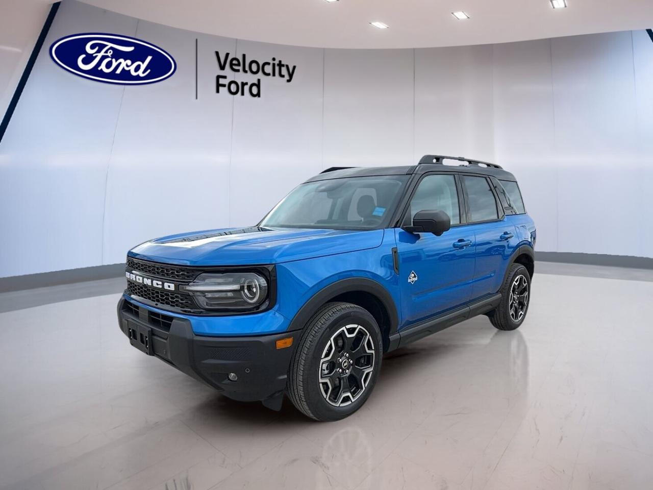 // ACCIDENT FREE!! //
// SINGLE OWNER! //

This 2025 Ford Bronco Sport Outer Banks 4x4  is a smart SUV for life in Moose Jaw. CARFAX Canada reports no accident, and it has had a single owner. With only 4,841 km, this used Ford offers fresh condition, easy confidence, and proven value.

Finished in Blue with a Black interior, this Ford brings a clean, modern look to every drive. The 1.5-litre unleaded engine works with an 8-speed automatic transmission and four-wheel drive for smooth daily travel, solid traction, and capable all-season performance across Saskatchewan roads.

FEATURES OF THE Bronco Sport Outer Banks 4x4 COMING SOON
»» Blue exterior with black interior
»» 1.5-litre engine with automatic transmission
»» Four-wheel drive for added traction
»» Low 4,836 km on odometer

ADVANCED SAFETY FEATURES
»» Backup camera helps with reversing
»» Blind spot monitor adds awareness
»» Lane departure warning supports safer travel
»» Multiple airbags help protect occupants

PERFORMANCE AND EFFICIENCY
»» 1.5-litre unleaded engine saves fuel
»» Eight-speed automatic shifts smoothly
»» Four-wheel drive improves road grip
»» Power steering supports easy handling

COMFORT AND CONVENIENCE
»» Heated front seats add winter comfort
»» Remote starter warms cabin quickly
»» Dual-zone climate control adds comfort
»» Memory seat settings save preferences

TECHNOLOGY AND CONNECTIVITY
»» Bluetooth integration supports hands-free calling
»» Satellite radio expands listening choices
»» Steering wheel audio controls help
»» Push button start adds convenience

CARGO SPACE
»» Rear trunk access simplifies loading
»» Four-door layout aids passenger entry
»» Flexible SUV space suits errands
»» Room for gear and groceries

AWARDS & RECOGNITIONS
»» Top Safety Pick, Insurance Institute for Highway Safety, 2024

WHAT OTHER OWNERS LIKE
»» Easy entry and upright seating
»» Useful cargo area for daily needs
»» Confident winter traction and stability
»» Simple controls and comfortable ride

Velocity Ford in Moose Jaw is offering an SUV that fits busy routines and changing weather with ease. Heated mirrors, electric mirrors, power windows, automatic headlights, LED headlamps, fog lights, tinted windows, and a rear window defroster all help make daily driving easier and more comfortable.

This Ford also includes cruise control, anti-lock braking system, stability control, tire pressure monitoring, child safety locks, automatic door locks, and an auto-dimming rearview mirror. Added convenience comes from a power driver seat, passenger power seat, driver lumbar support, memory mirrors, and illuminated vanity mirrors.

If you want a low-kilometre SUV with one-owner history, accident-free CARFAX Canada reporting, and the comfort features drivers use every day, this 2025 Ford Bronco Sport Outer Banks 4x4 deserves your attention.

This 2025 Ford Bronco Sport Outer Banks 4x4  VIN is: 3FMCR9CN9SRF42582.