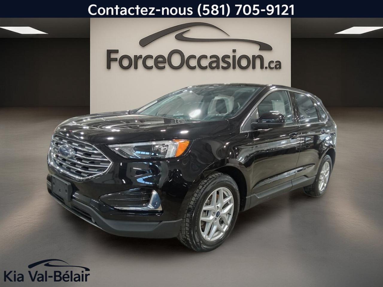 Un Seul Propriétaire // Inspecté en 135 points

Le Ford Edge SEL 2022 usagé proposé par Kia Val-Bélair à Québec mise sur une configuration simple et utile pour le quotidien. Avec son moteur 2,0 litres à essence, sa transmission automatique à 8 vitesses, son rouage intégral et ses équipements comme la caméra de recul, Apple CarPlay et les sièges avant chauffants, ce VUS répond bien aux besoins dune famille active.

CARACTÉRISTIQUES DU Edge SEL * AWD * CAMERA * CRUISE * CARPLAY * SIEGES CHAUFF *

»» Rouage intégral pour meilleure motricité annuelle  
»» Transmission automatique à 8 vitesses  
»» Siège conducteur à réglage électrique  
»» Hayon électrique pour accès simplifié au coffre  

CARACTÉRISTIQUES DE SÉCURITÉ AVANCÉES

»» Avertissement de sortie de voie inclus  
»» Surveillance des angles morts intégrée  
»» Caméra de recul pour manoeuvres quotidiennes  
»» Contrôle de stabilité et freins ABS  

PERFORMANCE ET EFFICACITÉ

»» Moteur 2,0 litres sans plomb  
»» Transmission automatique à 8 rapports  
»» Différentiel à glissement limité inclus  
»» Direction assistée pour conduite plus légère  

CONFORT

»» Sièges avant chauffants pour lhiver  
»» Climatisation automatique à deux zones  
»» Démarrage par bouton-poussoir pratique  
»» Démarreur à distance déjà équipé  

TECHNOLOGIE ET CONNECTIVITÉ

»» Apple CarPlay mentionné dans léquipement  
»» Intégration Bluetooth pour appels mains libres  
»» Commandes audio pratiques au volant  
»» Point daccès WiFi à bord  

ESPACE DE CHARGEMENT

»» Hayon électrique pour chargement plus simple  
»» Accès au coffre arrière pratique  
»» Banquette et coffre utiles au quotidien  
»» Format VUS adapté aux besoins familiaux  

RÉCOMPENSES ET RECONNAISSANCES

»» Meilleur choix sécurité, Insurance Institute for Highway Safety, 2022  

APPRÉCIÉ DES AUTRES PROPRIÉTAIRES

»» Conduite stable et rassurante sur route  
»» Habitacle silencieux pour les longs trajets  
»» Sièges avant chauffants appréciés lhiver  
»» Accès facile grâce au hayon électrique  

GARANTIE

»» Garantie légale seulement  
»» Garantie dusage  
»» Garantie de durée raisonnable  
»» Garantie contre les vices cachés  

Affichant 86 499 km à lodomètre, ce Ford Edge SEL 2022 présente une combinaison recherchée de rouage intégral, déquipements de confort bien choisis et de technologies utiles au quotidien. Sa finition noire à lextérieur comme à lintérieur lui donne une allure sobre et facile à apprécier. Avec ses 4 portes, ses vitres électriques, ses rétroviseurs chauffants et ses phares automatiques, il demeure un choix logique pour circuler à Québec en toute saison.

Le NIV de ce Ford Edge SEL * AWD * CAMERA * CRUISE * CARPLAY * SIEGES CHAUFF * 2022 est le 2FMPK4J98NBA50563 .

Garantie prolongée disponible, livraison en 48h