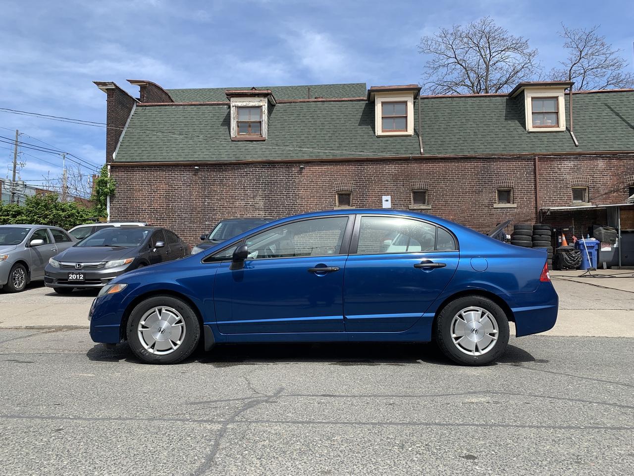 2011 Honda Civic 4dr Auto DX-G Photo