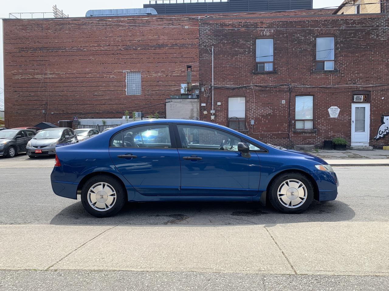 2011 Honda Civic 4dr Auto DX-G Photo