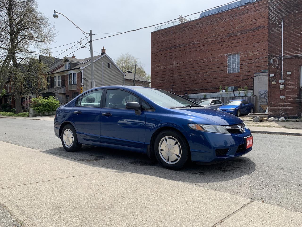 2011 Honda Civic 4dr Auto DX-G Photo