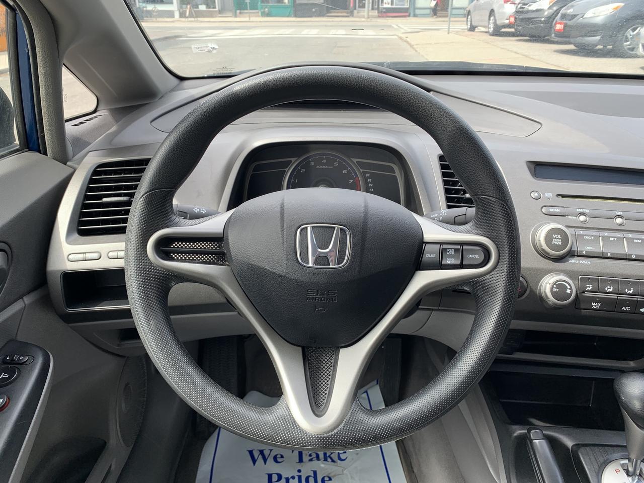 2011 Honda Civic 4dr Auto DX-G Photo