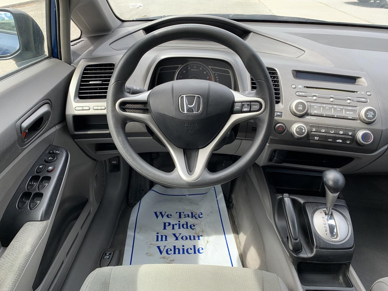 2011 Honda Civic 4dr Auto DX-G Photo