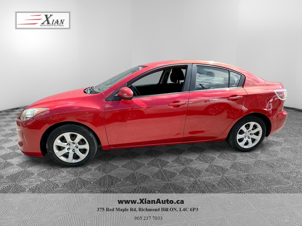 2013 Mazda MAZDA3 4dr Sdn Auto GX Photo3