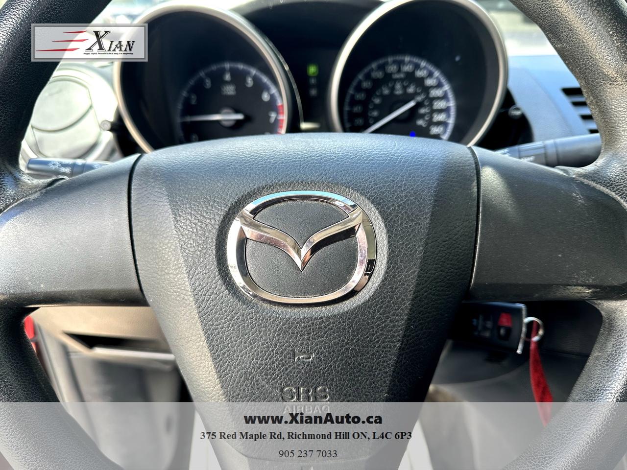 2013 Mazda MAZDA3 4dr Sdn Auto GX Photo