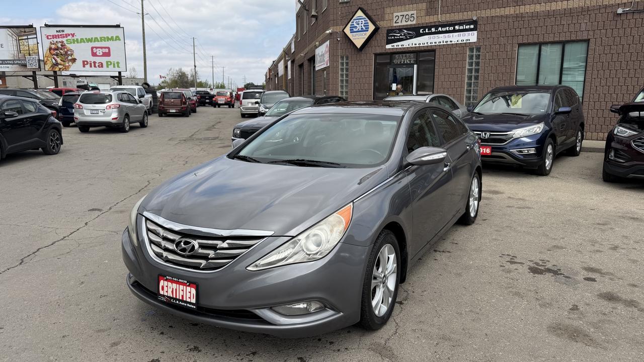 <p class=MsoNormal>This 2011 Hyundai Sonata is an excellent car that comes fully-loaded for all your needs. Back-up camera, cruise control, navigation system, and other viable features allow for a pleasant journey with every drive. Comfort ranges from air conditioning, to heated seats, to the sunroof, ensuring you and up to 4 other passengers can enjoy your drive. This fuel-efficient, accident-free vehicle is a great choice for those looking for a capable and trustworthy car.&nbsp;</p><p class=MsoNormal>Financing is available for all credit types OAC. Carfax provided for every vehicle.</p><p class=MsoNormal>Prices include certification of vehicle, first oil change, and professional detailing; taxes and licensing extra.</p><p class=MsoNormal>3-month warranty included, can be extended for additional cost. Inquire for more details.</p><p class=MsoNormal>Family-run business with friendly staff. Our customers are our number one priority. Satisfaction guaranteed.</p><p>&nbsp;</p><p class=MsoNormal><strong>C.L.S Auto Sales</strong>&nbsp;2795 Barton St. E., Hamilton, ON, L8E 2J8. <br>Office #: 905-561-8030<span style=mso-tab-count: 1;>&nbsp;&nbsp;&nbsp;&nbsp;&nbsp;&nbsp;&nbsp;&nbsp;&nbsp; </span>After-Hours #: 905-517-4507</p>