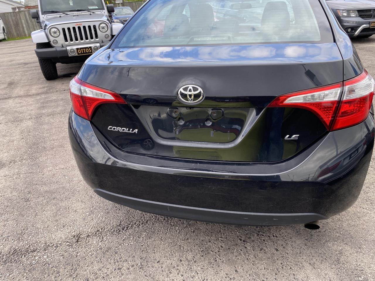 2014 Toyota Corolla 4dr Sdn CVT LE Photo