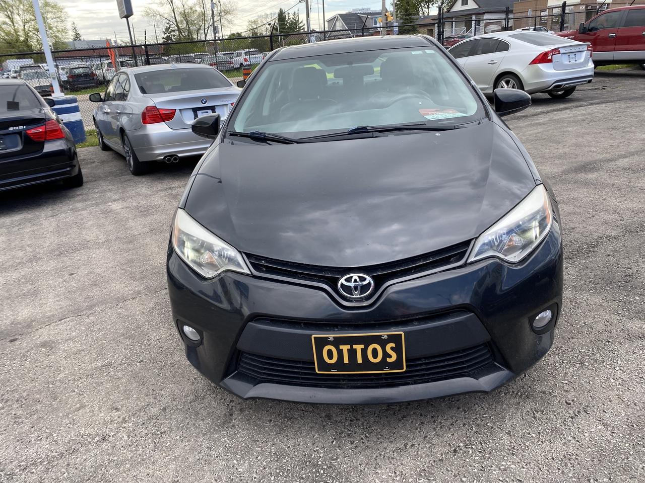 2014 Toyota Corolla 4dr Sdn CVT LE Photo