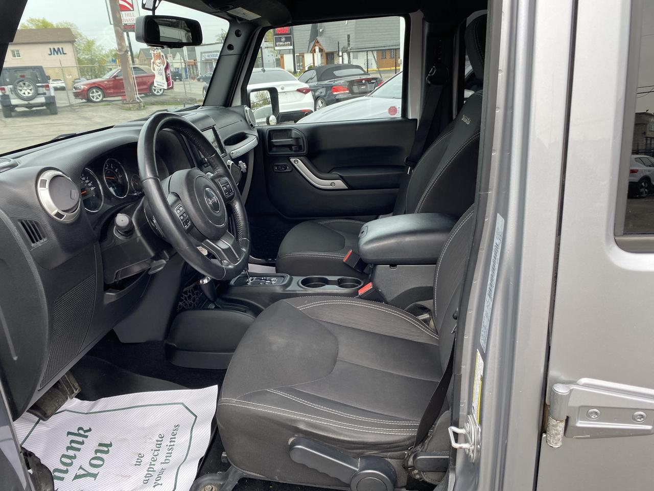 2017 Jeep WRANGLER UNLIMITED 4WD 4dr Sahara Photo