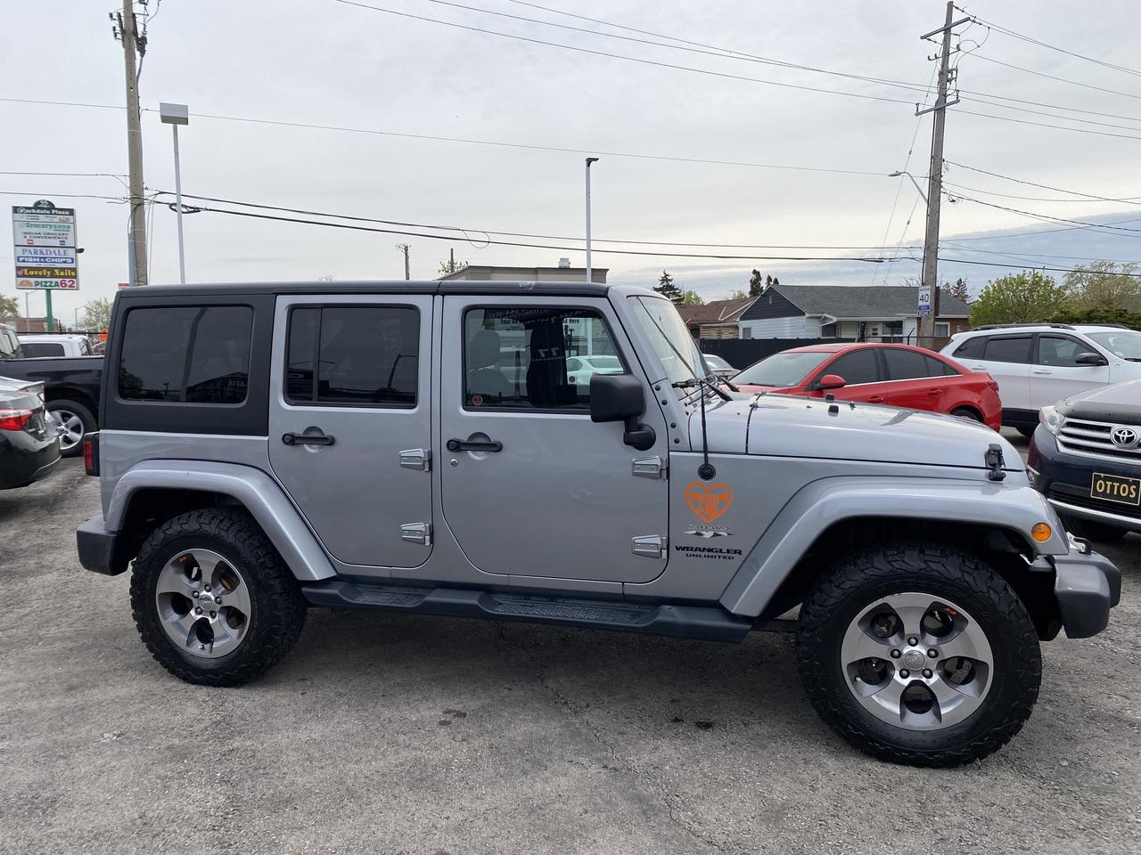 2017 Jeep WRANGLER UNLIMITED 4WD 4dr Sahara Photo