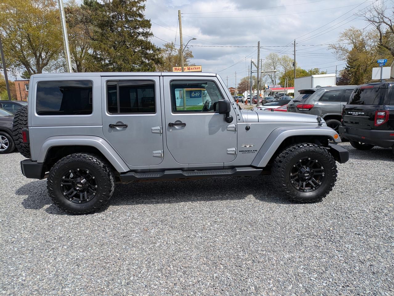 2016 Jeep Wrangler 4WD 4DR SAHARA Photo