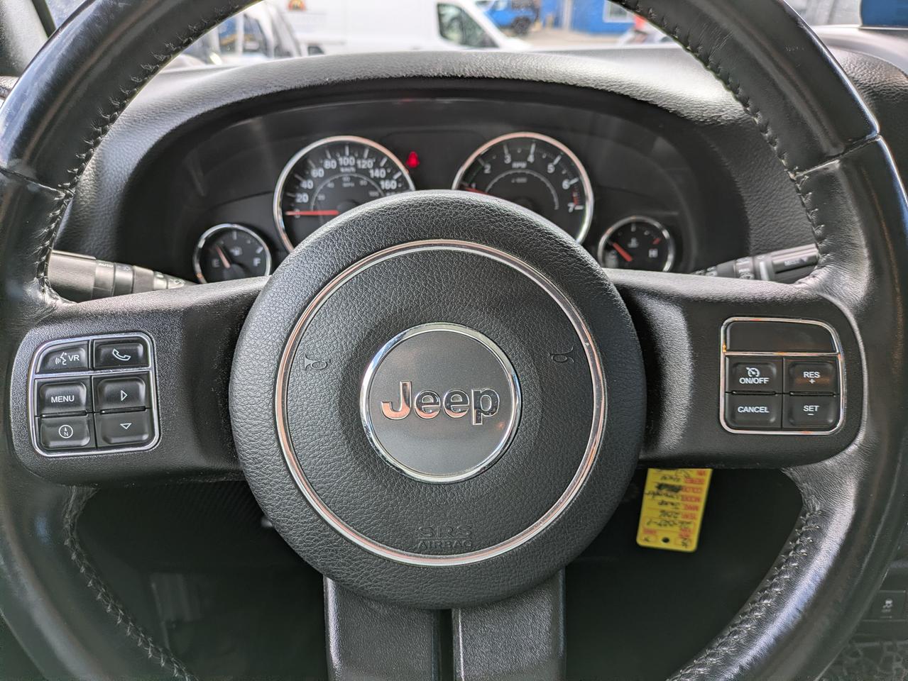 2016 Jeep Wrangler 4WD 4DR SAHARA Photo
