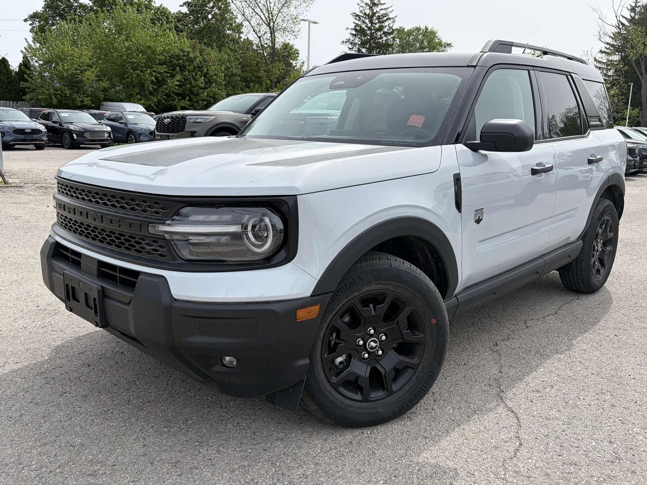 <p>Get ready to conquer any adventure with the brand new 2026 Ford Bronco Sport Big Bend 4x4, now available at Winegard Ford! This rugged yet refined SUV is built for those who crave exploration without sacrificing comfort and style. Whether youre navigating city streets or venturing off the beaten path, the Bronco Sport Big Bend is your ultimate companion, offering a dynamic driving experience and the capability to handle whatever comes your way. Its bold design, coupled with a suite of intelligent features, makes it the perfect choice for drivers who demand versatility and a touch of wild.</p>
<p>The 2026 Bronco Sport Big Bend 4x4 is more than just an SUV; its an invitation to discover. Its robust construction and advanced 4x4 system are engineered to provide confidence and control in diverse conditions, while the spacious interior is designed with your comfort and convenience in mind. From its intuitive technology to its practical cargo solutions, every aspect of this new Ford is crafted to enhance your journey. Come down to Winegard Ford and experience the freedom and capability that the Bronco Sport Big Bend delivers.</p>
<p>Here are 5 features that truly sizzle on the 2026 Ford Bronco Sport Big Bend 4x4:</p>
<ul>
<li><strong>Terrain Management System™ with 5 G.O.A.T. Modes:</strong> Conquer any terrain with confidence. Dial in your drive for Normal, ECO, Sport, Slippery, or Off-Road conditions, and let the Bronco Sport adapt to your adventure.</li>
<li><strong>Black Appearance Package:</strong> Turn heads with a striking aesthetic. Featuring a textured matte black hood graphic, unique black accent badges, a painted Shadow Black roof, and 17" Matte Black wheels, this package adds an undeniable edge.</li>
<li><strong>Adaptive Cruise Control with Stop-and-Go:</strong> Enjoy a more relaxed drive, especially on longer journeys. This intelligent system automatically adjusts your speed to maintain a safe distance from the vehicle ahead, even bringing you to a complete stop.</li>
<li><strong>Pre-Collision Assist with Automatic Emergency Braking (AEB):</strong> Drive with enhanced peace of mind. This advanced safety feature can detect potential frontal collisions and automatically apply the brakes if you dont react in time.</li>
<li><strong>BLIS® (Blind Spot Information System) with Rear Cross-Traffic Braking:</strong> Stay aware of your surroundings. BLIS® alerts you to vehicles in your blind spots, while Rear Cross-Traffic Braking helps you back out of parking spots safely by detecting approaching vehicles.</li>
</ul>
<p><strong><em>Powered by AutoIntelligence™</em></strong></p>
<p>Vehicle information has been generated using artificial intelligence and is provided for informational purposes only. While efforts are made to ensure accuracy, please confirm all details directly with the dealer.</p>
