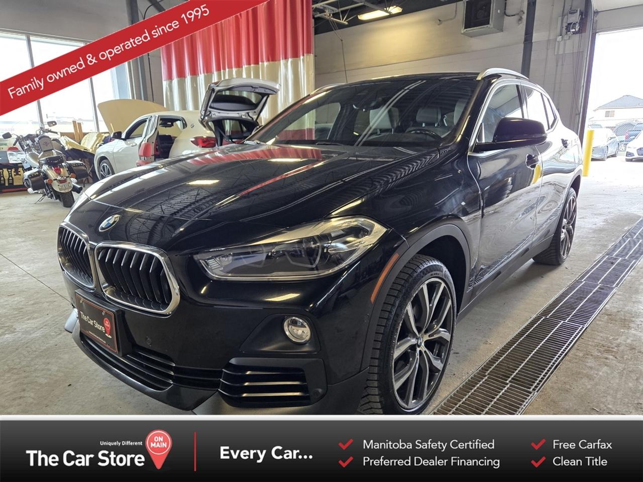 2018 BMW X2 xDrive28i &ndash; Premium Enhanced | No Accidents | Summer and Winter Tires 
 Key Features: 
 xDrive All-Wheel Drive 
 Premium Enhanced Package 
 Summer and Winter Tires 
 New Battery 
 Panoramic Sunroof, Power Tailgate 
 Heated Power Sport Seats with Memory 
 Heated Steering Wheel 
 Head-Up Display, Ambient & Welcome Lighting 
 Apple CarPlay, Bluetooth, Navigation 
 Comfort Access with Push-Button Start 
 Front & Rear Parking Sensors 
 Driver Assistance Package: 
 Frontal Collision Warning 
 Lane Departure Warning 
 Pedestrian Detection 
 
 
 Sporty, Sophisticated, and City-Ready: 
 The 2018 X2 delivers standout styling and sharp handling in a compact package. With the Premium Enhanced trim and xDrive confidence, it&rsquo;s equally at home downtown or on the open road. 
 
 
 Clean History, Like-New Condition: 
 No accidents, no stories&mdash;just a well-kept, well-optioned X2 with a new battery and two sets of tires(Winter&Summer). Stylish, practical, and ready for its next chapter. 
 
 
 Our Take: 
 This X2 punches above its weight with premium features and BMW driving dynamics. It&rsquo;s a smart pick for professionals or small families who want something upscale, fun, and winter-ready&mdash;without going full-size. 
 
 
 We are a local Family Owned business and we try to do things a little different. 
 
 At The Car Store on Main every vehicle is Manitoba Safety Certified. 
 Every vehicle sold is eligible for the Advantage Plan: 
 30 Day Warranty on all MB Safety certificate related items. 
 CarFax Vehicle History Report 
 2 sets of Keys 
 Wholesale access to all other Miscellaneous Accessories (i.e. Wtr Tires, Remote Starr, all misc vehicle accessories/parts, etc...) 
 And of course a Full tank of Gas. 
 
 There is no Gimmicks or games, we are always aggressive on our prices and try to separate ourselves from the rest. 
 We also have an on-site Certified Banker who shops to get the best possible interest rates in with all Major Banks and Credit Unions! 
 
 Come to our Brand New modern showroom and see what makes us Uniquely Different! 
 
 Located on Main St. just North of Chief Peguis Trail. 
 
 To schedule an appointment call us directly at 204-669-1248 or email sales@thecarstore.ca 
 
 The Car Store on Main 
 -Uniquely Different- 
 
 www.thecarstore.ca 
 Local: 204-669-1248 
 Toll Free: 877-634-2975 
 
 A local family owned business unlike typical car lots, there are no pressure tactics, no games, no gimmicks, no Sales Manager, General Manager or Used Car Manager, just straight answers and fair deals all the time! 
 
 *PRICE DOES NOT INCLUDE TAXES (G.S.T & P.S.T) 
 Dealer Permit # 4481