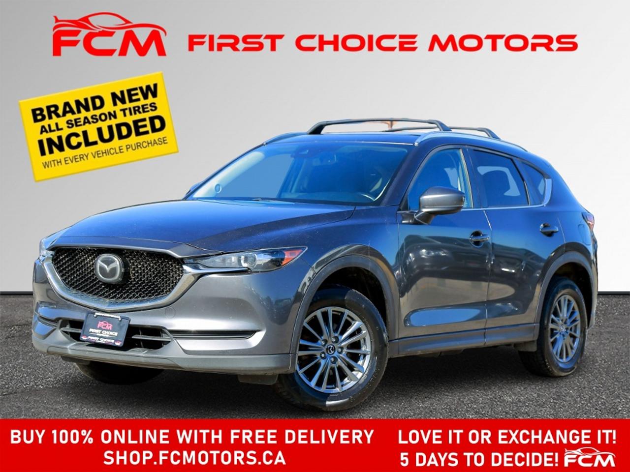 ** ** SPECIAL LIMITED TIME OFFER ** ** PURCHASE ANY VEHICLE THIS WEEK AND RECEIVE 4 BRAND-NEW ALL-SEASON TIRES AT NO ADDITIONAL COST!!! DON   T MISS THIS EXCLUSIVE CHANCE TO UPGRADE YOUR RIDE AND STAY PREPARED FOR ANY WEATHER!!! <br><br>EXCITING NEWS FROM FIRST CHOICE MOTORS! Our brand-new online showroom is now open to the public, bringing the ultimate car shopping experience right to your fingertips! Enjoy a 100% online car shopping experience, with over 500 certified vehicles in stock, comprehensive protection plans, and thousands of new auto parts & accessories available! Plus, for a limited time, were offering FREE deliveries across Ontario on all vehicle purchases! Dont miss out   visit Shop.fcmotors.ca to find and upgrade your perfect vehicle today!<br><br>Welcome to First Choice Motors, the largest car dealership in Toronto of pre-owned cars, SUVs, and vans priced between $5000-$15,000. With an impressive inventory of over 300 vehicles in stock, we are dedicated to providing our customers with a vast selection of affordable and reliable options. <br><br>Were thrilled to offer a used 2017 Mazda CX-5 GS Skyactiv, grey color with 195,000km (STK#9869) This vehicle was $15990 NOW ON SALE FOR $14990. It is equipped with the following features:<br>- Automatic Transmission<br>- Leather Seats<br>- Sunroof<br>- Heated seats<br>- All wheel drive<br>- Bluetooth<br>- Blind spot monitor<br>- Reverse camera<br>- Alloy wheels<br>- Power windows<br>- Power locks<br>- Power mirrors<br>- Air Conditioning<br><br>At First Choice Motors, we believe in providing quality vehicles that our customers can depend on. All our vehicles come with a 36-day guarantee on all safety related items. We also offer additional warranty options up to 5 years for our customers who want extra peace of mind.<br><br>Furthermore, all our vehicles are sold fully certified with brand new brakes rotors and pads, a fresh oil change, and brand new set of all-season tires installed & balanced. You can be confident that this car is in excellent condition and ready to hit the road.<br><br>At First Choice Motors, we believe that everyone deserves a chance to own a reliable and affordable vehicle. Thats why we offer financing options with low interest rates starting at 7.9% O.A.C. Were proud to approve all customers, including those with bad credit, no credit, students, and even 9 socials. Our finance team is dedicated to finding the best financing option for you and making the car buying process as smooth and stress-free as possible.<br><br>Our dealership is open 7 days a week to provide you with the best customer service possible. We carry the largest selection of used vehicles for sale under $9990 in all of Ontario. We stock over 300 cars, mostly Hyundai, Chevrolet, Mazda, Honda, Volkswagen, Toyota, Ford, Dodge, Kia, Mitsubishi, Acura, Lexus, and more. With our ongoing sale, you can find your dream car at a price you can afford. Come visit us today and experience why we are the best choice for your next used car purchase!<br><br>All prices include $22.00 OMVIC Fee.  Excludes, license plates, ownership registration and ONTARIO HST (13%)<br>*No Credit Card payments can be accepted for Vehicle Purchases*