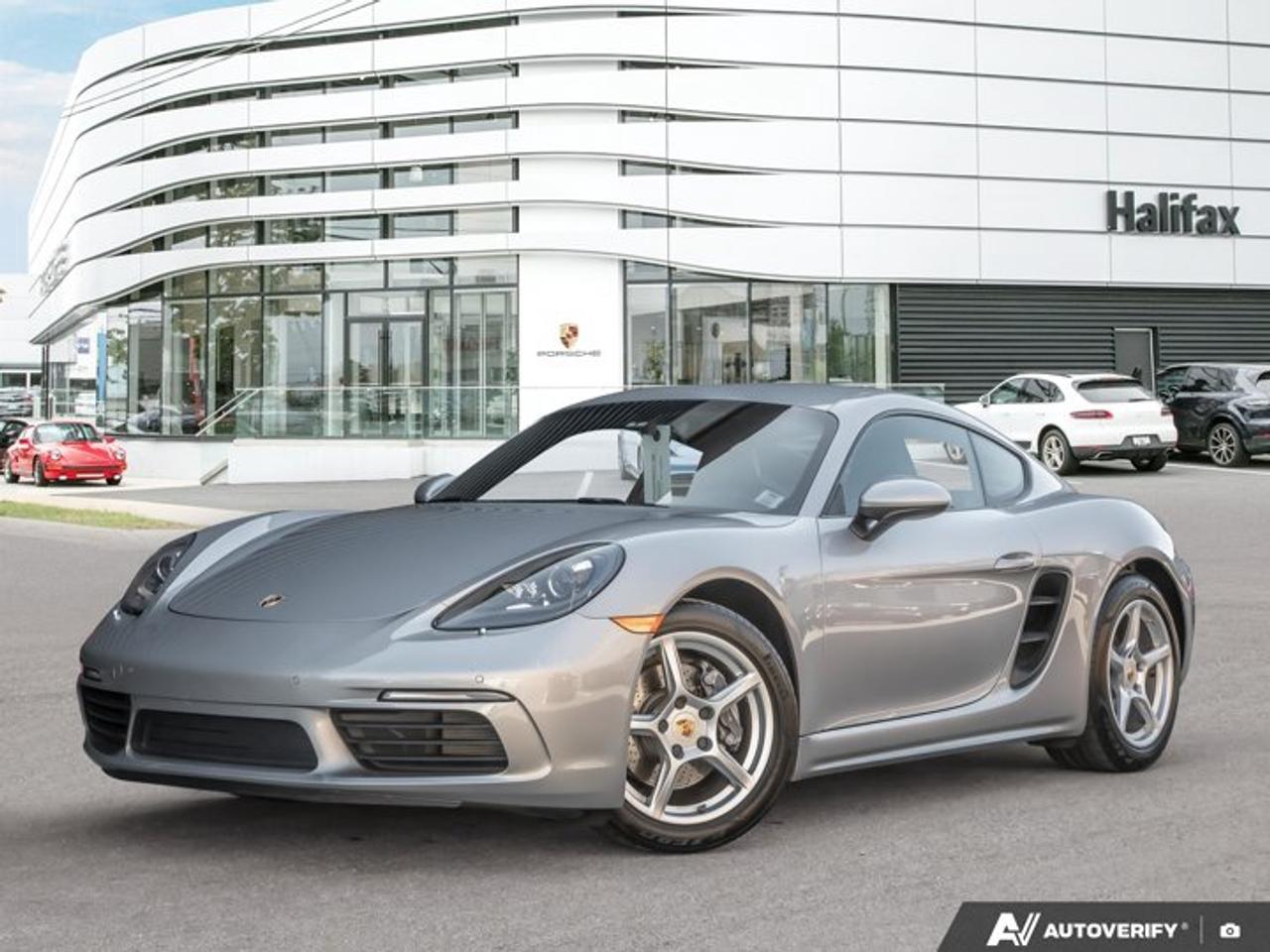 This 2018 Porsche 718 Cayman, now available at Porsche Of Halifax, is finished in GT Silver Metallic with a Standard Interior in Black with Leather Package i.c.w. Sport Seats and is equipped with a PDK transmission.*Powertrain and Drivetrain*2.0-litre turbocharged flat-4 engine producing 300 horsepowerPDK transmissionRear-wheel drive*Exterior*GT Silver MetallicBi-Xenon? Headlights with Porsche Dynamic Light System18 Boxster WheelsWheel Center Caps with Colored Porsche Crest*Interior and Seating*Standard Interior in Black with Leather Package i.c.w. Sport SeatsHeated multifunction steering wheel2-Zone Automatic Climate ControlSeat heating*Technology and Driver Assistance*Navigation Module for Porsche Communication Management (PCM)Lane Change Assist (LCA)Automatically dimming mirrors with integrated rain sensorPower Steering PlusThis 718 Cayman is configured with a mid-engine rear-wheel-drive layout, a turbocharged flat-4 powertrain, and a selection of comfort and driver assistance features suited for everyday driving.Visit www.porscheofhalifax.com or call (902)453-8800 to speak with a Porsche Sales Executive.