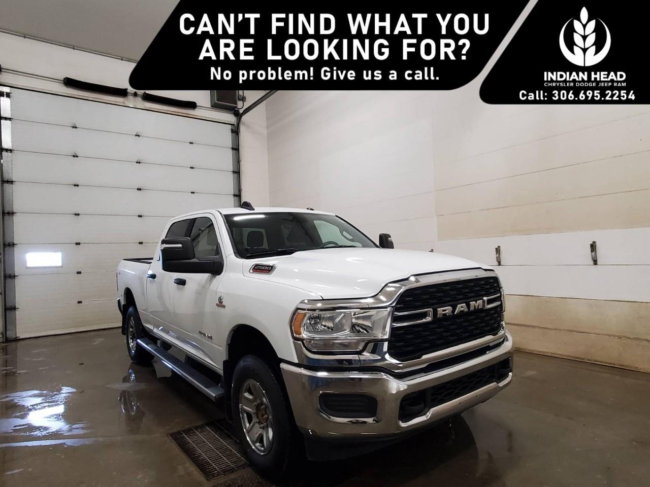 <p>The 2024 Ram 2500 Big Horn Crew Cab 4x4 is built to handle demanding jobs with confidence while delivering the comfort and capability you expect from a heavy-duty Ram truck.</p><p>Finished in <strong>Bright White with a Black and Diesel Grey interior</strong>, this Ram 2500 combines rugged styling with a durable and functional cabin designed for work and everyday driving alike.</p><p>Power comes from the legendary <strong>6.7L Cummins® I-6 turbocharged diesel engine</strong> paired with a <strong>6-speed automatic transmission</strong>, giving you the torque and capability needed for towing, hauling, and tackling tough conditions with ease.</p><p>This Crew Cab configuration offers excellent passenger space and practicality, while features like <strong>push-button start, remote keyless entry, cruise control, air conditioning, and a 3.5-inch full-colour in-cluster display</strong> help keep every drive comfortable and convenient.</p><p>Capability-focused equipment includes a <strong>Class V hitch receiver, trailer sway control, trailer light check system, 4-pin and 7-pin wiring harnesses, tow hooks, and heavy-duty front and rear shock absorbers</strong>, making this truck ready to work.</p><p>Additional features include <strong>ParkView® Rear Back-Up Camera, remote start system, heated and power-adjustable towing mirrors, electronic shift-on-the-fly transfer case, and locking tailgate</strong>.</p><p>Safety systems include <strong>Ready Alert Braking, Hill Start Assist, Electronic Stability Control, Electronic Roll Mitigation, Brake Assist, and advanced multistage front airbags</strong>.</p><p>Whether you need dependable diesel performance for the jobsite or a capable truck for towing and travel, the 2024 Ram 2500 Big Horn Crew Cab 4x4 is ready for the challenge.</p><p>Please confirm all vehicle details and features with our sales team and start the buying process today at Indian Head Chrysler Dodge Jeep Ram Ltd., conveniently located just 35 minutes east of Regina on the TransCanada Highway.</p>