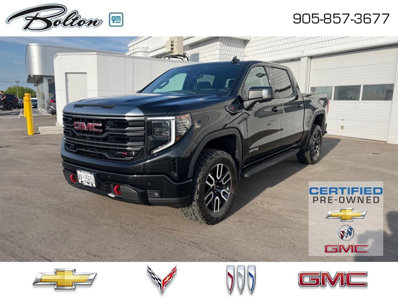 <b>CERTIFIED PRE-OWNED - FINANCE @ 0.99%<br><br><br>Premium Package!<br> <br></b><br>  Our sales staff will help you find that used vehicle you have been looking for - come see us today!<br> <br>This professional grade Sierra 1500 has the proven GMC power you expect from your truck, ensuring that every haul, every trailering experience, and every family trip is handled like a pro. This 2022 GMC Sierra 1500 is fresh on our lot in Bolton.<br> <br>This redesigned GMC Sierra 1500 stands out against all other pickup trucks, with sharper, more powerful proportions that creates a commanding stance on and off the road. Next level comfort and technology is paired with its outstanding performance and capability. Inside, the Sierra 1500 supports you through rough terrain with expertly designed seats and a pro grade suspension. Inside, youll find an athletic and purposeful interior, designed for your active lifestyle. Get ready to live like a pro in this amazing GMC Sierra 1500!<br> <br>This Crew Cab 4X4 pickup has 98,131 km and is a Certified Pre-Owned vehicle. Its Onyx Black in colour. It has an Automatic transmission and is powered by a 420HP 6.2L 8 Cylinder Engine. And its got a certified used vehicle warranty for added peace of mind. <br> <br> Our Sierra 1500s trim level is AT4. Built for adventure, this ultra capable GMC Sierra 1500 AT4 comes very well equipped with an off-road suspension with skid plates, perforated leather seats, exclusive aluminum wheels, body-coloured exterior accents and a massive 13.4 inch touchscreen display that features wireless Apple CarPlay and Android Auto, Bose premium audio, SiriusXM, plus a 4G LTE hotspot. Additionally, this amazing pickup truck also features a spray-in bedliner, wireless device charging, IntelliBeam LED headlights, remote engine start, forward collision warning and lane keep assist, a trailering package with hitch guidance, LED cargo area lighting, teen driver technology, a HD rear vision camera plus so much more! This vehicle has been upgraded with the following features: Leather Seats, Premium Package.<br> <br>To apply right now for financing use this link: <a href=http://www.boltongm.ca/?https://CreditOnline.dealertrack.ca/Web/Default.aspx?Token=44d8010f-7908-4762-ad47-0d0b7de44fa8&Lang=en target=_blank>http://www.boltongm.ca/?https://CreditOnline.dealertrack.ca/Web/Default.aspx?Token=44d8010f-7908-4762-ad47-0d0b7de44fa8&Lang=en</a><br> <br/>This vehicle has met our highest standard and has been put through the GM certification process by our GM trained technicians. Our GM Certified used vehicles go thru an extensive 150 + point inspection and are reconditioned back to near new condition. Each vehicle comes with a minimum of a 3 month, 5000 KM warranty or the balance of the factory warranty (whichever is longer) with 24 hour roadside assistance. They also come with satisfaction guaranteed; a 30 day or 2500 km exchange privilege if you are not completely satisfied. And thats standard. If your budget permits, you can extend or upgrade to an even more comprehensive Certified Pre-Owned Vehicle Protection Plan. Youll also appreciate the convenience of being able to transfer any existing warranties to a new owner, should you ever decide to sell your Certified Pre-Owned Vehicle. If you are a student or recently graduated, you may also qualify for an additional $500 discount when a used GM vehicle is purchased.  For more information, please call any of our knowledgeable used vehicle staff at 877-335-7544.<br> <br/><br>Call 1-877-626-5866 NOW before this vehicle is sold!!! 
*No Hassles, No Haggles, No Admin Fees,* *JUST OUR BEST PRICE, FIRST*!!!
*** GOOD CREDIT, BAD CREDIT, NO CREDIT, LET OUR FINANCE MANAGERS SHOW YOU THE DIFFERENCE THAT BUYING FROM BOLTON GM WILL MAKE, WE SPECIALIZE IN REBUILDING YOUR CREDIT!!!!*** 
Bolton GM is Only 15 minutes from Hwy 9, 400, 427 and 410
See our complete inventory at www.boltongm.ca
<br> Come by and check out our fleet of 20+ used cars and trucks and 120+ new cars and trucks for sale in Bolton.  o~o