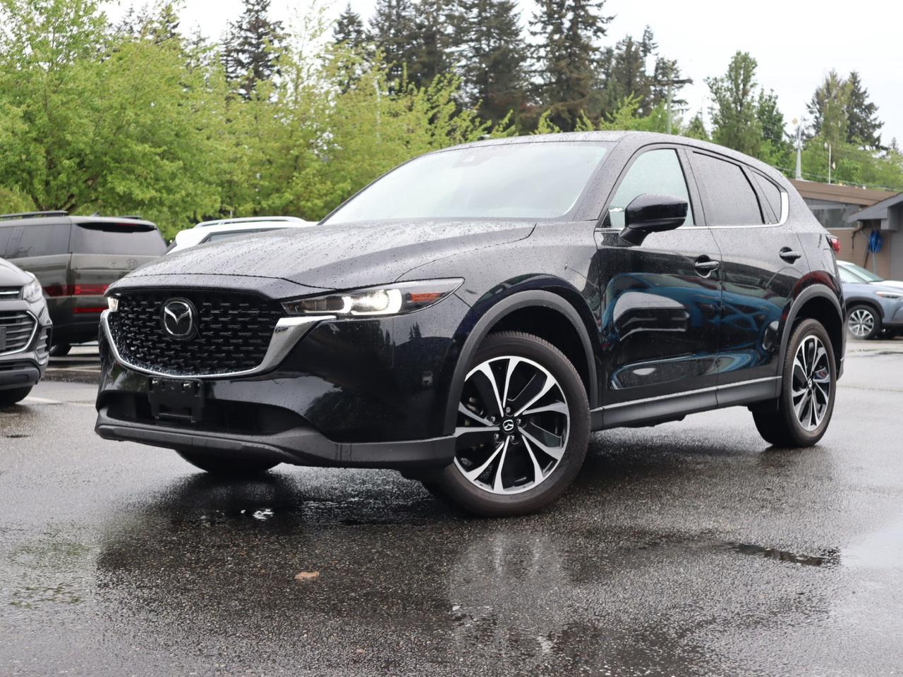 Leather Interior | Power Sunroof | Navigation | Heated Seats | Bose Premium Audio | Apple CarPlay & Android Auto | Adaptive Cruise Control | AWD<br /><br />2022 Mazda CX 5 Grand Touring AWD<br />This 2022 Mazda CX 5 Grand Touring AWD is now available at White Rock Hyundai, offering premium comfort, confident performance, and refined styling in a versatile compact SUV. Powered by a responsive engine paired with Mazdas intelligent all wheel drive system, this CX 5 delivers a smooth and engaging driving experience for commuting and weekend travel throughout White Rock, South Surrey, Surrey, Delta, Langley, and Vancouver. With its upscale design, quiet cabin, and strong reputation for reliability, the Mazda CX 5 continues to stand out in the compact SUV segment.<br />Inside, this 2022 Mazda CX 5 Grand Touring AWD is well equipped with features including leather interior, navigation, heated seats, a power sunroof, Bose premium audio, Apple CarPlay, Android Auto, and adaptive cruise control for added comfort and convenience. Advanced safety technology helps provide confidence on the road, making this SUV an excellent fit for daily driving and family use alike. If you're searching for a used Mazda CX 5 for sale in White Rock, this Grand Touring AWD offers an impressive combination of luxury, technology, and all weather capability.<br /><br /><br />Why Buy From us?<br />*7x Hyundai President's Award of Merit Winner<br />*3x Consumer Choice Award for Business Excellence<br />*AutoTrader Dealer of the Year M-Promise Certified Preowned ($995 value):<br />- 30-day/2,000 Km Exchange Program<br />- 3-day/300 Km Money Back Guarantee<br />- Comprehensive 144 Point Mechanical Inspection<br />- Full Synthetic Oil Change<br />- BC Verified CarFax<br />- Minimum 6 Month Power Train Warranty Our vehicles are priced under market value to give our customers a hassle free experience.<br /><br />We factor in mechanical condition, kilometres, physical condition, and how quickly a particular car is selling in our market place to make sure our customers get a great deal up front and an outstanding car buying experience overall. At White Rock Hyundai, we help you get where you want to go. *All vehicle purchases are subject to a $799 administration fee. *Dealer #31129.<br /><br /><br />Odometer is 5389 kilometers below market average!<br /><br /><br />CALL NOW!! This vehicle will not make it to the weekend!!