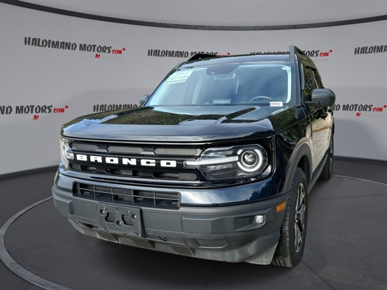 // ACCIDENT FREE!! //<br /><br />This 2023 Ford Bronco Sport Outer Banks 4WD is a smart SUV for daily driving and weekend travel. It is finished in Black with a Blue interior and has 102,134 km. With its automatic transmission, 1.5-litre gas engine, and confident four-wheel drive, it is ready for changing Ontario roads.<br /><br />Sold by Haldimand Motors Ltd. in Cayuga, this used 2023 Ford Bronco Sport Outer Banks 4WD blends comfort, useful tech, and practical utility. The heated steering wheel adds welcome comfort in cold weather, while the accident-free history gives added peace of mind for your next drive.<br /><br />FEATURES OF THE Bronco Sport Outer Banks 4WD | No Accidents | Heated Steering<br />   Heated steering wheel for winter comfort<br />   Four-wheel drive for added traction<br />   Black exterior with Blue interior<br />   1.5-litre gas engine with automatic<br /><br />ADVANCED SAFETY FEATURES<br />   Backup camera helps with reversing<br />   Blind spot monitor adds awareness<br />   Lane departure warning supports safer travel<br />   Side and head airbags included<br /><br />The 2023 Ford Bronco Sport Outer Banks 4WD is built to make driving easier in traffic, parking lots, and on busy highways. Key safety features include a backup camera, blind spot monitor, lane departure warning, stability control, anti-lock braking system, child safety locks, and multiple airbags.<br /><br />PERFORMANCE AND EFFICIENCY<br />   1.5-litre gas engine balances power<br />   Eight-speed automatic shifts smoothly<br />   Four-wheel drive boosts road confidence<br />   Cruise control supports relaxed highway driving<br /><br />This 2023 Ford Bronco Sport Outer Banks 4WD delivers smooth response for commuting and road trips alike. The 1.5-litre engine works well with the 8-speed automatic transmission for easy power delivery, while power steering and four-wheel drive help maintain confident control in changing weather.<br /><br />COMFORT AND CONVENIENCE<br />   Heated front seats for cold mornings<br />   Dual-zone climate control adds comfort<br />   Memory seats simplify driver setup<br />   Push button start adds convenience<br /><br />Inside, this 2023 Ford Bronco Sport Outer Banks 4WD offers comfort-focused features that make every trip more enjoyable. You get heated front seats, a heated steering wheel, dual-zone automatic climate control, front air conditioning, power windows, tinted windows, and rear trunk access for everyday ease.<br /><br />The cabin also includes thoughtful driver aids such as an adjustable steering wheel, drivers seat lumbar support, drivers side power seat, electric passenger seat, memory seats, memory mirrors, illuminated vanity mirrors, and an auto-dimming rearview mirror. Ambient lighting adds a refined touch after dark.<br /><br />TECHNONOLGY AND CONNECTIVITY<br />   Apple CarPlay keeps apps accessible<br />   Android Auto supports smartphone integration<br />   Bluetooth connects calls and music<br />   WiFi hotspot adds online access<br /><br />This 2023 Ford Bronco Sport Outer Banks 4WD keeps you connected with modern in-car technology. Apple CarPlay, Android Auto, Bluetooth integration, satellite radio, steering wheel audio controls, and a WiFi hotspot help make each drive more convenient, whether you are commuting, travelling, or running errands.<br /><br />CARGO SPACE<br />   Rear cargo area handles daily gear<br />   Four doors improve passenger access<br />   Rear trunk access eases loading<br />   Spare tire adds practical support<br /><br />Practicality is a major strength of this 2023 Ford Bronco Sport Outer Banks 4WD. The SUV layout gives you flexible room for groceries, sports gear, travel bags, and more. Four doors make entry simple for passengers, while the rear cargo area supports busy family and daily life needs.<br /><br />AWARDS & RECOGNITIONS<br />   Top Safety Pick, Insurance Institute for Highway Safety, 2023<br /><br />WHAT OTHER OWNERS LIKE<br />   Easy-to-use infotainment and controls<br />   Comfortable ride for daily driving<br />   Useful cargo space and versatility<br />   Winter-friendly heated features and traction<br /><br />This 2023 Ford Bronco Sport Outer Banks 4WD VIN is: 3FMCR9C63PRD56102.<br /><br />WHY CHOOSE US? <br /><br />Honest & Transparent Buying Experience: Weve been a trusted name in business since 1984.<br /><br />STRAIGHTFORWARD PRICING:<br />Our Advertised Price Includes:<br />>>Safety Certification (No separate fee!)<br />>>30-Day 100% Mechanical Warranty<br />>>FREE Carfax History Report.<br />>>No upcharge for paying cash.<br />(Prices Exclude HST and Licensing Fees only.)<br /><br />>>Browse 300+ vehicles all in ONE LOCATION<br /><br />EASY FINANCING: Great rates & open loans<br /><br />WE BUY CARS: Get Top Dollar for your trade-in, or sell us your vehicle for CASH! Even if you dont buy from us!<br /><br />STOP BY TODAY<br />Treat yourself - stop by Haldimand Motors Ltd. located at 42 Talbot St E, Cayuga, ON N0A 1E0 to make this car yours today!<br /><br />https://www.haldimandmotors.com/used/stock-460654.html