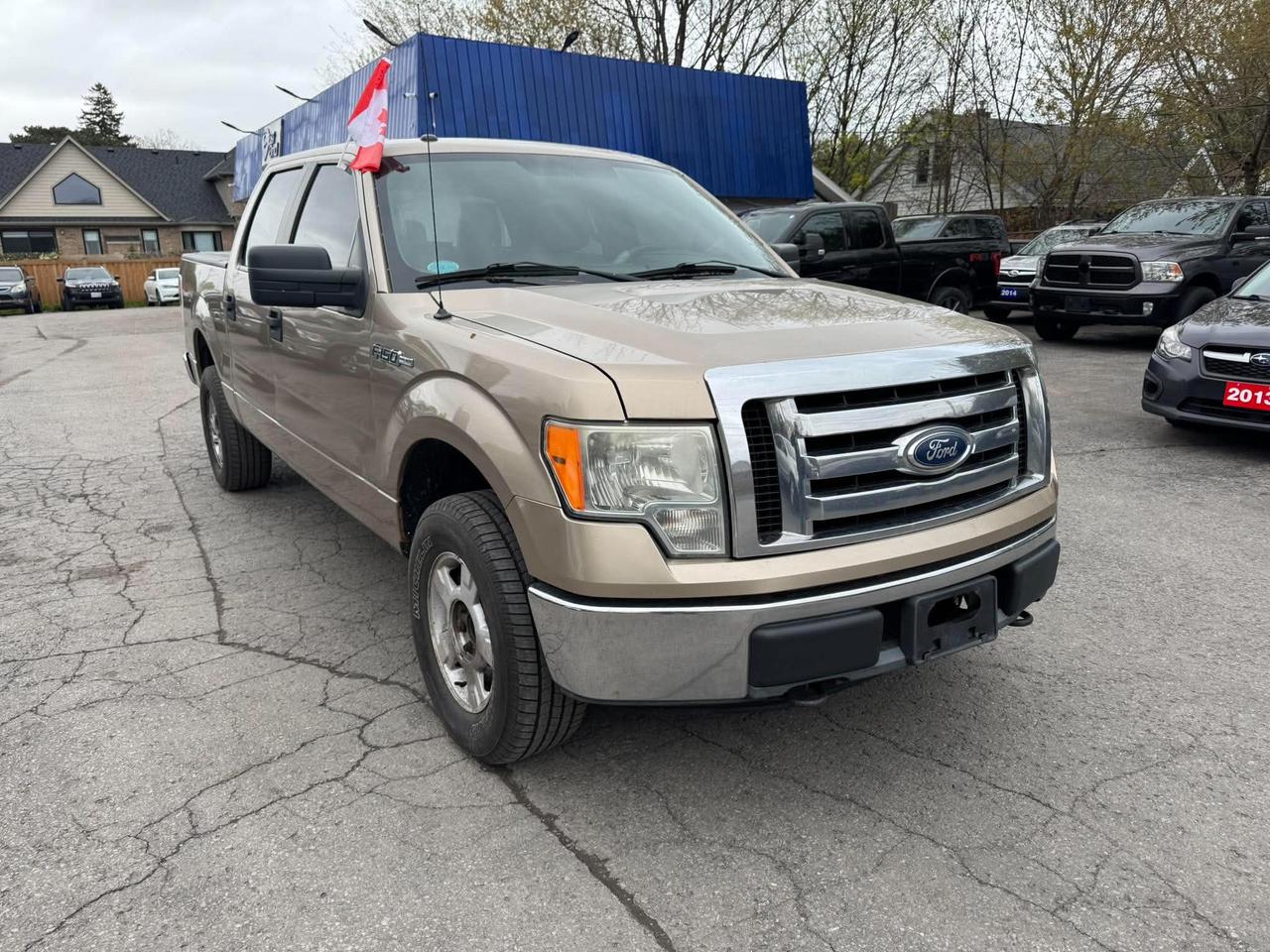 2011 Ford F-150 4WD SUPERCREW 145" XLT Photo