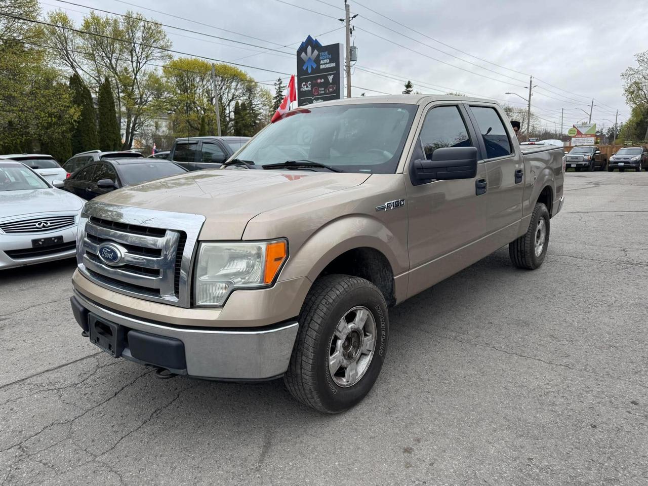 2011 Ford F-150 4WD SUPERCREW 145" XLT Photo