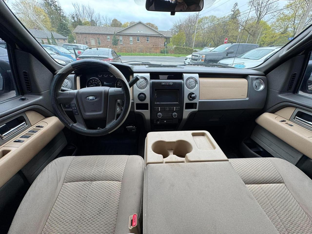 2011 Ford F-150 4WD SUPERCREW 145" XLT Photo