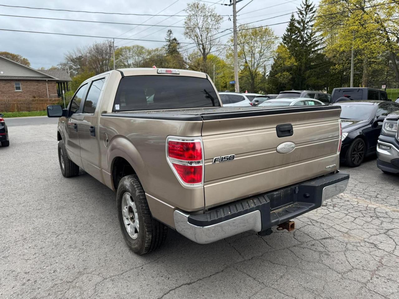 2011 Ford F-150 4WD SUPERCREW 145" XLT Photo4