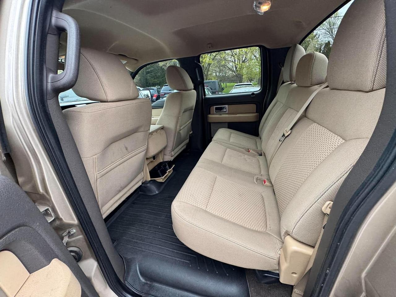 2011 Ford F-150 4WD SUPERCREW 145" XLT Photo