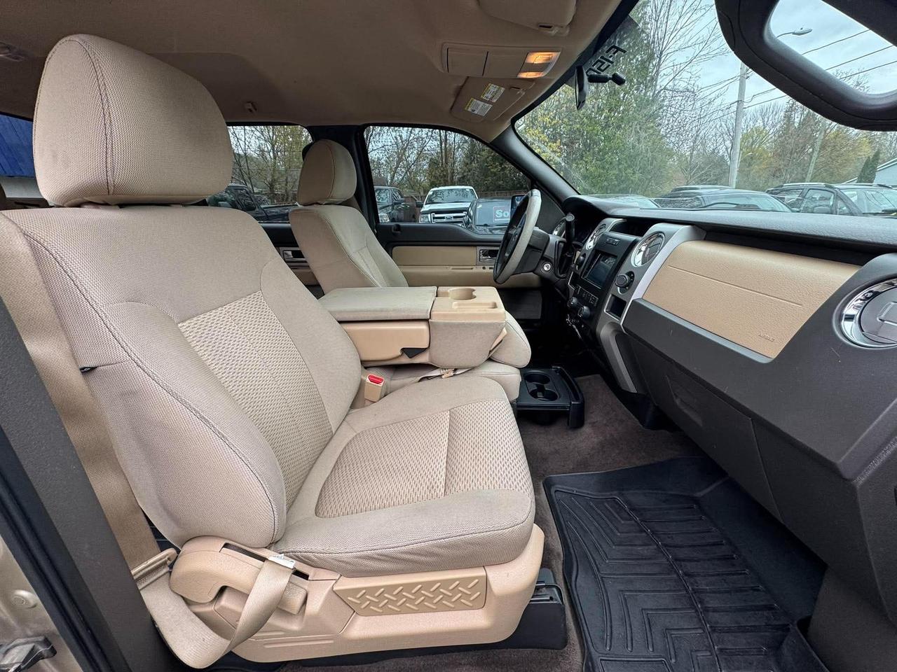 2011 Ford F-150 4WD SUPERCREW 145" XLT Photo
