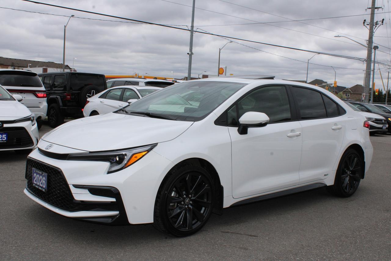 2026 Toyota Corolla Hybrid SE CVT AWD Photo2