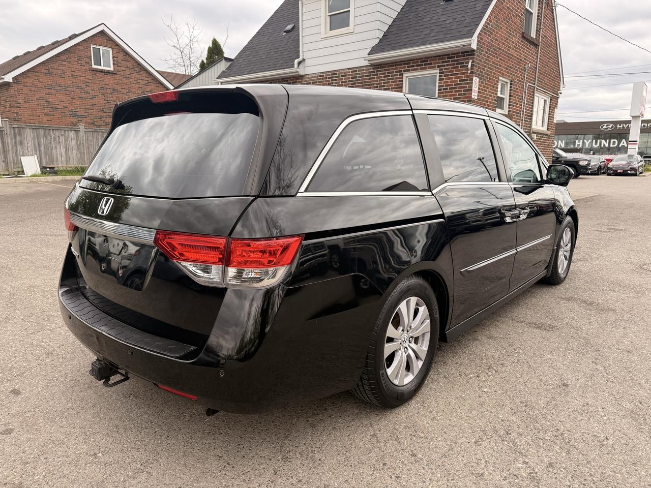 2014 Honda Odyssey EX-L | Two Sets of Wheels Photo