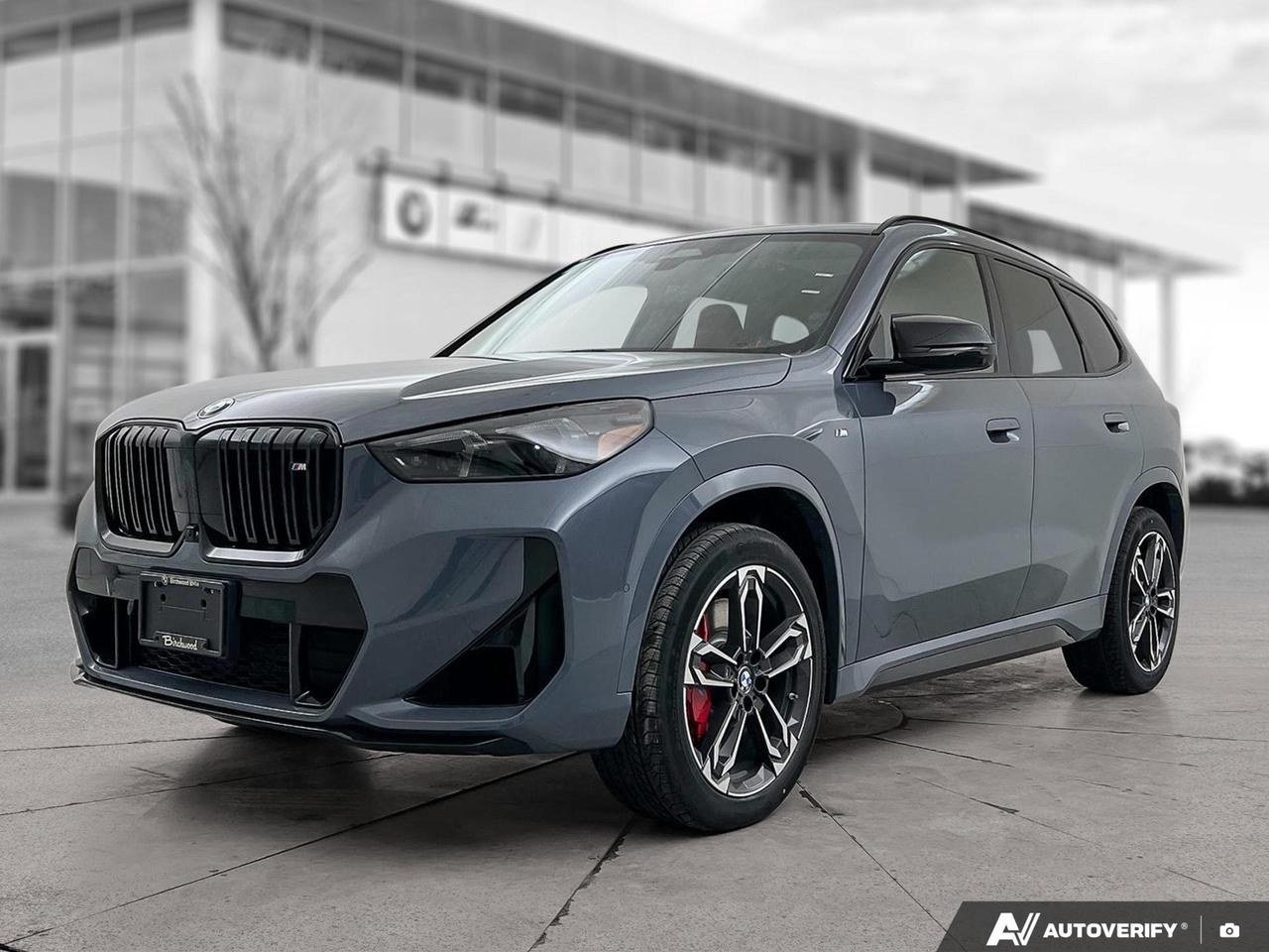 The 2026 BMW X1 M35i xDrive is the performance-minded compact SUV built for drivers who demand more from every commute and weekend adventure. Finished in striking Storm Bay Metallic with a Coral Red/Black interior, this X1 is stacked with the M Sport Pro Package, Premium Enhanced Package, and Black Exterior Contents  making it one of the most complete and aggressive configurations available on the lot today.

- 2.0L Intercooled Turbo I-4 paired with a 7-Speed Dual Clutch transmission with shift paddles for a genuinely engaging, sport-focused driving experience
- Driver Control Ride Control Sport Tuned Adaptive Suspension for dynamic handling without sacrificing everyday comfort
- M Sport Pro Package adds performance styling and sport seats with Perforated Veganza upholstery and Coral Red/Black interior contrast
- Black Exterior Contents Package gives this X1 a blacked-out, purposeful aesthetic that sets it apart from standard trims
- Premium Enhanced Package brings elevated technology and convenience features throughout the cabin
- harman/kardon premium sound system, wireless Apple CarPlay and Android Auto, and an integrated navigation system with voice activation
- Heated front seats, dual-zone automatic climate control, power front seats with driver memory, and proximity key with remote start
- Comprehensive safety suite including Blind Spot Detection, Rear Cross-Traffic Alert, Front Collision Mitigation, Lane Departure Warning, and Park Distance Control front and rear

Birchwood BMW invites you to experience this vehicle in person  reserve it online, start your purchase through our website at birchwoodbmw.ca, or book a test drive appointment with our team. Were here to make the process straightforward and enjoyable, on your terms.
At Birchwood BMW we know that experience is everything - thats why weve been voted #1 BMW Store in Canada for Customer Satisfaction for the past 3 years.  

Visit us today and see for yourself why were the top-rated luxury dealer in Manitoba on Google. Book your appointment at 204-452-7799. Dealer Permit #9740
Dealer permit #9740