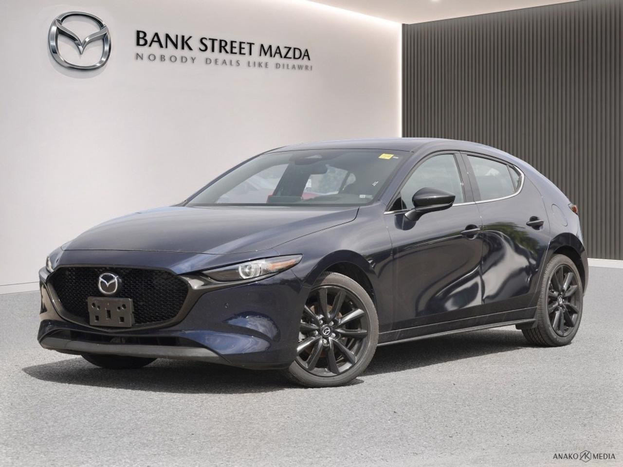 Experience the thrill behind the wheel of the 2024 Mazda3 Sport GT with Turbo, a meticulously designed sedan that boasts Mazdas iconic GT w/Turbo Auto i-ACTIV AWD system. This vehicle, draped in a dynamic color theme, offers a driving experience that is as controlled as it is exhilarating. On the outside, youll appreciate the sophistication of alloy wheels and the aerodynamic lines that give it a distinctive presence on the road. Step inside to find an interior that blends comfort and style, featuring leather seats and a leather steering wheel that exude luxury and confidence. The sunroof/moonroof adds a touch of elegance, enhancing your driving experience with natural light and panoramic views. The Mazda3 Sport GT w/Turbo is equipped with state-of-the-art technology and safety features designed to enhance every journey. Stay connected with Bluetooth integration and enjoy an intuitive navigation system displayed on a crisp heads-up display. Feel secure with advanced safety features including lane assist, backup camera, and brake assist. Plus, with adaptive cruise control and parking sensors, every drive is not only safer but more enjoyable. If youre a discerning driver looking for a blend of performance and style in your daily ride, the Mazda3 Sport GT with Turbo is tailored for you. Contact our dealership today to explore the features of this remarkable vehicle and take it for a test drive.