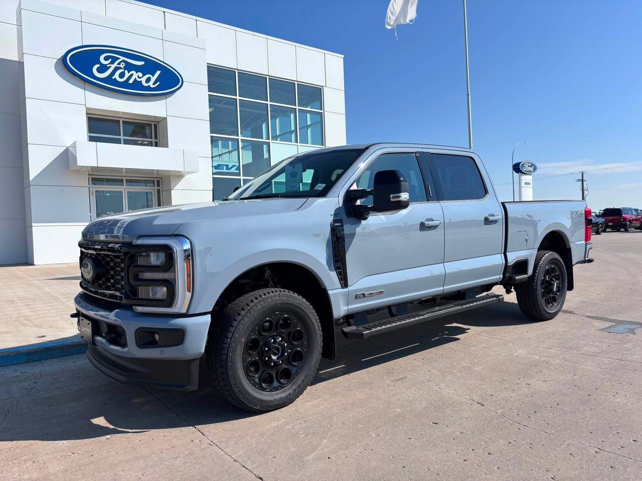 <p>Get ready to experience the ultimate in capability and luxury with the brand new 2026 Ford F-350 4x4 Crew Cab Pickup, now available at Webbs 1441. This isnt just a truck; its a command centre built to conquer any challenge, whether its hauling heavy loads for your business, towing your weekend adventures, or simply navigating the demands of Canadian life. Dressed in a striking Glacier Grey Metallic finish and featuring the aggressive Black Appearance Package, this F-350 makes a bold statement before you even turn the key. Inside, the Lariat trim surrounds you with premium comfort and cutting-edge technology, ensuring every drive is as refined as it is powerful.</p>
<p>Underneath its commanding presence lies the heart of a beast: the legendary 6.7L Power Stroke V8 Diesel engine, paired with a smooth 10-speed TorqShift automatic transmission. This powertrain is engineered for relentless performance and unwavering reliability, ready to tackle the toughest jobs with ease. The 4x4 capability, combined with the FX4 Off-Road Package and its included skid plates, means you can confidently venture off the beaten path, knowing this F-350 is built to handle it. From its robust construction to its thoughtful features designed for the modern driver, this new 2026 Ford F-350 is the perfect partner for those who demand the best.</p>
<p>Here are five features that truly set this 2026 Ford F-350 apart:</p>
<ul>
<li><strong>6.7L Power Stroke V8 Diesel Engine:</strong> Unleash unparalleled towing and hauling power with this legendary diesel powerhouse, designed for maximum torque and efficiency.</li>
<li><strong>FX4 Off-Road Package with Skid Plates:</strong> Conquer any terrain with confidence, thanks to enhanced off-road suspension, specialized shocks, and robust underbody protection.</li>
<li><strong>Black Appearance Package with 20" Black Gloss Wheels:</strong> Turn heads with a menacingly stylish look, featuring blacked-out accents and striking gloss black alloy wheels.</li>
<li><strong>Lariat Premium Package:</strong> Elevate your driving experience with luxurious appointments, including a power sliding rear window for ultimate convenience and connectivity.</li>
<li><strong>5th Wheel/Gooseneck Hitch Prep:</strong> Be ready for any towing task with integrated preparation for fifth-wheel and gooseneck trailers, making hauling your largest loads a breeze.</li>
</ul>
<p><strong><em>Powered by AutoIntelligence™</em></strong></p>
<p>Powered by AutoIntelligence™</p>
