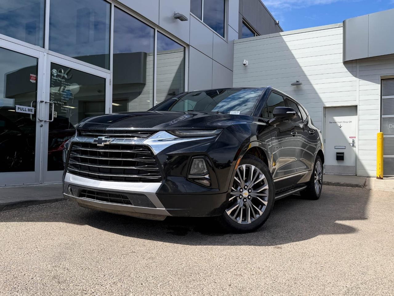 Experience style, power, and advanced features with this pre-owned 2020 Chevrolet Blazer Premier AWD in sleek Black. Powered by a robust 3.6L V6 engine paired with a smooth 9-speed automatic transmission, this SUV delivers confident performance with advanced all-wheel drive and selectable drivetrain modes for any road condition.Enjoy premium comfort with perforated leather-appointed seats featuring heated and ventilated front seats, plus memory settings for driver seat and exterior mirrors. The Blazers advanced infotainment system includes Chevrolet Infotainment 3 Premium, Bose 8-speaker audio, SiriusXM with 360L, and integrated navigation through an 8-inch touchscreen.Packed with safety and convenience, it offers blind spot warning, rear parking sensors, power liftgate, and smart key with push-button start and remote start. With roomy seating for five and a host of luxury and tech features, this Blazer Premier is the perfect blend of sophisticated style and everyday versatility.Visit us today to test drive this exceptional SUV and elevate your driving experience!Go Mazda is an AMVIC licensed businessThis vehicle is showing a CarFax incident in the amount of $14,062.00