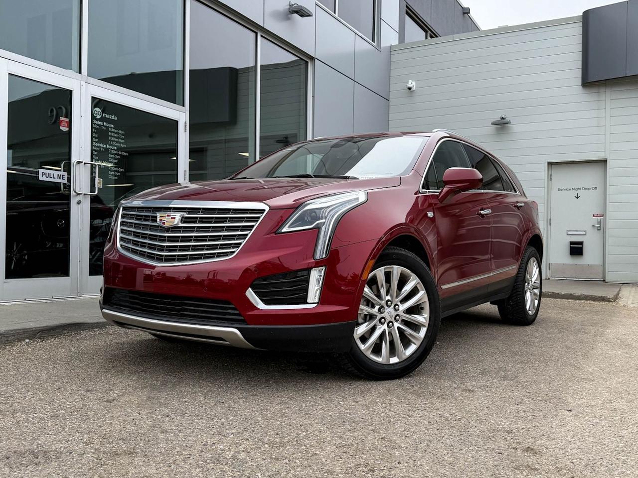Experience luxury and performance with this stunning pre-owned 2018 Cadillac XT5 Platinum AWD in eye-catching Red. Powered by a refined 3.6L V6 engine paired with an 8-speed automatic transmission, it delivers smooth, responsive driving with advanced all-wheel drive for confidence in any condition.Step inside to discover semi-aniline full leather heated and ventilated front seats, a premium Bose Studio Surround Sound system, and the Cadillac User Experience touchscreen with embedded navigation. Enjoy modern convenience with features like front and rear park assist, advanced safety including low-speed forward automatic braking, and a powerful security package.Ride in comfort and style with performance suspension, adaptive ride control, and 20 polished wheels that turn heads wherever you go. This XT5 Platinum blends sophistication with capability  perfectly crafted for your daily drives and weekend adventures.Visit us today and elevate your driving experience with this beautifully equipped Cadillac XT5 Platinum AWD!Go Mazda is an AMVIC licensed businessThis vehicle is showing a CarFax incident in the amunt of $10,375.00