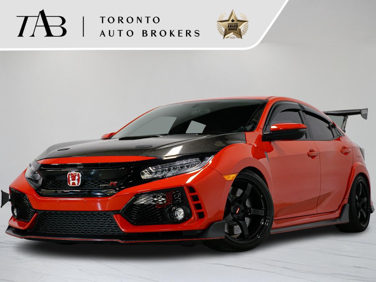 This 2018 Honda Civic is a local Ontario vehicle. Combining efficiency, sporty performance, and modern technology, this Civic offers a fun and engaging driving experience, making it an ideal car for both city commuting and weekend drives.

Key features Include: 

Radium engineering dual catch can 
Mishimoto intercooler and charge pipes
Hondata 
Prl street air intake 
Prl high flow cat downpipe 
Rv6 front pipe
Hybrid racing clutch master cylinder 
Acuity short throw shifter assembly 
Acuity pedal spacer 
Works bell tilt module 
Momo & spoon special edition steering wheel 
Works bell instrument cluster adapter 
Works bell short steering wheel hub 
Unit 2 fabrication oil billet pan 
Pwr radiator 
Spoon thermostat 
Swift lowering springs 
Rays 57cr gloss black rims with continental extreme contact sport 02 (just purchased last summer) 
Eibach rear sway bar with mounting brace 
Eibach anti roll bar with rear end links 
Ultra racing strut bar 
27 won rear motor mount 
MXP catback exhaust 
Stainless steel brake lines 
Seibon carbon fibre hood complete with racing hood latch and windshield set 
Voltex Racing Type 2 Adjustable Carbon fibre spoiler 

NOW OFFERING 3 MONTH DEFERRED FINANCING PAYMENTS ON APPROVED CREDIT. 

WE OFFER THE BEST FINANCE RATES, AND DONT CHARGE ANY FINANCING FEE

Looking for a top-rated pre-owned luxury car dealership in the GTA? Look no further than Toronto Auto Brokers (TAB)! Were proud to have won multiple awards, including the 2024 AutoTrader Best Priced Dealer, the 2026 Best in Business award, the 2025 CarGurus Award, the 2026 Top Choice Award, the 2026 Dealer Rater Consumer Satisfaction Award, the 2026 Canadian Choice Award, the 2026 Three Best Rated Dealer Award, and many more!

With 30 years of experience serving the Greater Toronto Area, TAB is a respected and trusted name in the pre-owned luxury car industry. Our 30,000 sq.Ft indoor showroom is home to a wide range of luxury vehicles from top brands like BMW, Mercedes-Benz, Audi, Porsche, Land Rover, Jaguar, Aston Martin, Bentley, Maserati, and more. And we dont just serve the GTA, were proud to offer our services to all cities in Canada, including Vancouver, Montreal, Calgary, Edmonton, Winnipeg, Saskatchewan, Halifax, and more.

At TAB, were committed to providing a no-pressure environment and honest work ethics. As a family-owned and operated business, we treat every customer like family and ensure that every interaction is a positive one. Come experience the TAB Lifestyle at its truest form, luxury car buying has never been more enjoyable and exciting!

We offer a variety of services to make your purchase experience as easy and stress-free as possible. From competitive and simple financing and leasing options to extended warranties, aftermarket services, and full history reports on every vehicle, we have everything you need to make an informed decision. We welcome every trade, even if youre just looking to sell your car without buying, and when it comes to financing or leasing, we offer same day approvals, with access to over 50 lenders, including all of the banks in Canada. Feel free to check out your own Equifax credit score without affecting your credit score, simply click on the Equifax tab above and see if you qualify.

Call us today or visit our website to learn more about our inventory and services. And remember, all prices exclude applicable taxes and licensing, and vehicles can be certified at an additional cost of $999