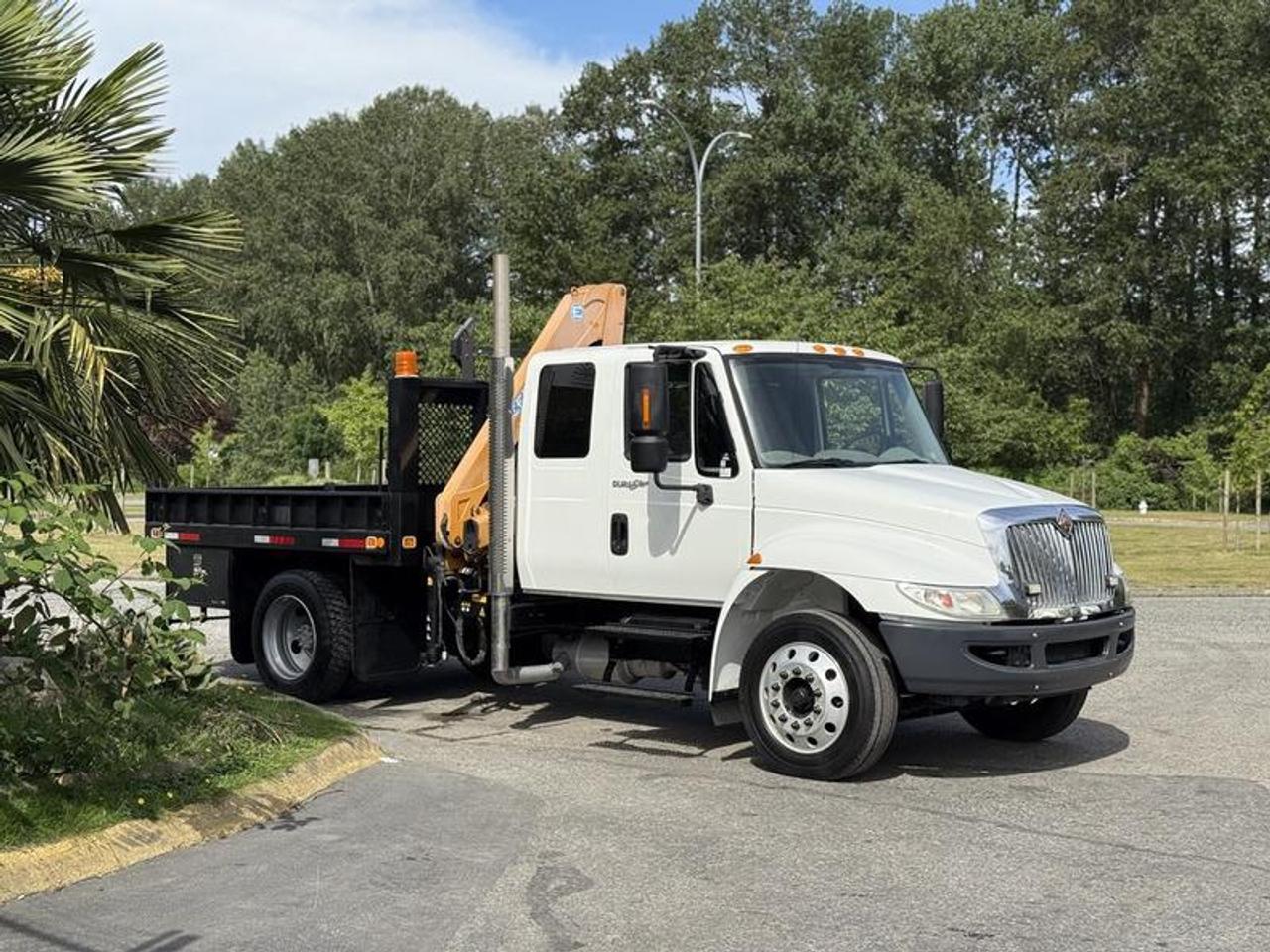This 2011 International 4300 crane flatdeck truck is powered by a 7.6L 6-cylinder diesel engine paired with an automatic transmission and configured as a 4x2. Equipped with an Effer 62-4S hydraulic crane offering a maximum reach of approximately 10.72 metres, this truck is suited for lifting, transport, utility, and commercial work applications.

Additional equipment includes a 9-foot hydraulic brake flatdeck, remote crane controls, air suspension airbags, air-assisted brakes, Econ mode, air seats, and a D&R AS5500 traffic signaler. Convenience features include power windows, power mirrors, power door locks, AM/FM radio, and air conditioning with heat. Finished in white with a gray cloth interior, this International offers a practical medium-duty crane truck setup for jobsite and fleet use.

Transport dimensions are approximately 24 feet long, 8 feet 6 inches wide, and 10 feet 4 inches high. This item is currently OFFSITE. You must register an appointment with our office to schedule an offsite viewing. Appointments must be made a minimum of one business day in advance (and as defined by the days that Repo.com is open for business) before your appointment can be scheduled and confirmed. We may, at our own discretion, instead opt to transport smaller items to Repo.coms main yard for viewing purposes.  $69,880.00 plus $375 processing fee, $70,255.00 total payment obligation before taxes.   Listing report, warranty, contract commitment cancellation fee, financing available on approved credit (some limitations and exceptions may apply). All above specifications and information is considered to be accurate but is not guaranteed and no opinion or advice is given as to whether this item should be purchased. We do not allow test drives due to theft, fraud, acts of vandalism and undetectable impaired driving. Instead we provide the following benefits: Complimentary Warranty (with options to extend), Limited Money Back Satisfaction Guarantee on Fully Completed Contracts, Contract Commitment Cancellation, and an Open-Ended Sell-Back Option. Ask seller for details or call 604-522-REPO(7376) to confirm listing availability.