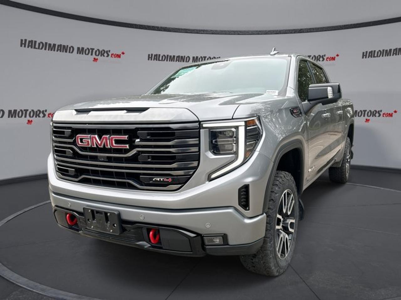 // ACCIDENT FREE!! //<br /><br />Built for drivers who want premium power and real truck capability, this used 2024 GMC Sierra 1500 AT4 Crew Cab 6 Box 4WD stands out with a bold black finish, a strong 6.2-litre unleaded engine, and a smooth automatic transmission. With 60,987 km, it delivers confident performance, upscale comfort, and serious utility for work or weekend travel.<br /><br />This GMC Sierra 1500 AT4 Crew Cab 6 Box 4WD is a great fit for Cayuga roads and beyond. It pairs off-road-ready character with everyday ease, thanks to features like ventilated front seats, adaptive cruise control, a sunroof, and a 360-degree camera. The accident-free history adds even more confidence to this well-equipped full-size pickup.<br /><br />FEATURES OF THE Sierra 1500 AT4 Crew Cab 6 Box 4WD | No Accidents | Ventilated Front Seats<br /><br />   Powerful 6.2-litre V8 gas engine<br />   Ventilated front seats for added comfort<br />   Sunroof brings in light and air<br />   Four-wheel drive for all-season traction<br /><br />TRUCK FEATURES<br /><br />   Tows up to 4,036 kg confidently<br />   Trailer hitch ready for hauling needs<br />   Trailer brake controller adds towing control<br />   Rear tow hook supports truck utility<br /><br />ADVANCED SAFETY FEATURES<br /><br />   Backup camera helps with tight parking<br />   Blind spot monitor adds lane confidence<br />   Lane departure warning supports safer travel<br />   Side and head airbags enhance protection<br /><br />PERFORMANCE AND EFFICIENCY<br /><br />   6.2-litre engine delivers strong V8 power<br />   Automatic transmission shifts smoothly and quickly<br />   Limited slip differential boosts traction<br />   Four-wheel drive handles rough conditions<br /><br />COMFORT AND CONVENIENCE<br /><br />   Ventilated front seats improve warm-weather comfort<br />   Heated front and rear seats<br />   Dual-zone automatic climate control included<br />   Remote starter adds everyday convenience<br /><br />TECHNONOLGY AND CONNECTIVITY<br /><br />   Apple CarPlay keeps apps within reach<br />   Android Auto supports easy smartphone access<br />   Bluetooth integration enables hands-free communication<br />   WiFi hotspot helps keep passengers connected<br /><br />CARGO SPACE<br /><br />   Crew Cab adds useful interior room<br />   6-foot box supports versatile hauling<br />   Rear trunk access improves loading ease<br />   Four doors simplify passenger entry<br /><br />AWARDS & RECOGNITIONS<br /><br />   Best Buy Award, The Car Guide, 2024<br />   Best Full-Size Pickup, Auto123.com, 2024<br /><br />WHAT OTHER OWNERS LIKE<br /><br />   Strong V8 power for towing confidence<br />   Comfortable cabin for long highway trips<br />   User-friendly technology and camera views<br />   Solid ride with capable four-wheel drive<br /><br />Inside, this GMC Sierra 1500 AT4 Crew Cab 6 Box 4WD offers the comfort many truck buyers want every day. Heated front seats, heated rear seats, a heated steering wheel, memory seats, power-adjustable front seats, lumbar support, tinted windows, and front air conditioning all help make each drive more relaxing.<br /><br />Convenience is also a strong point in this GMC Sierra 1500 AT4 Crew Cab 6 Box 4WD. Push-button start, power windows, power steering, heated mirrors, electric mirrors, retractable mirrors, automatic door locks, cruise control, and an auto-dimming rearview mirror all work together to make daily use simple and smooth.<br /><br />Technology is easy to enjoy in this GMC Sierra 1500 AT4 Crew Cab 6 Box 4WD. Steering wheel audio controls, satellite radio, HD Radio, Apple CarPlay, Android Auto, Bluetooth integration, and a WiFi hotspot help keep entertainment and communication close at hand whether you are commuting, travelling, or towing.<br /><br />This truck also brings extra confidence when road conditions change. Anti-Lock Braking System, stability control, tire pressure monitoring, adaptive cruise control, fog lights, LED headlamps, and a 360-degree camera help support visibility, awareness, and control in many driving situations.<br /><br />Finished in black and equipped with four doors, this accident-free pickup has the presence, comfort, and capability many buyers want in a full-size truck. If you need strong towing ability, premium features, and proven GMC toughness, this Sierra deserves your attention at Haldimand Motors Ltd. in Cayuga.<br /><br />This 2024 GMC Sierra 1500 AT4 Crew Cab 6 Box 4WD | No Accidents | Ventilated Front Seatss VIN is: 3GTUUEELXRG240753.<br /><br />WHY CHOOSE US? <br /><br />Honest & Transparent Buying Experience: Weve been a trusted name in business since 1984.<br /><br />STRAIGHTFORWARD PRICING:<br />Our Advertised Price Includes:<br />>>Safety Certification (No separate fee!)<br />>>30-Day 100% Mechanical Warranty<br />>>FREE Carfax History Report.<br />>>No upcharge for paying cash.<br />(Prices Exclude HST and Licensing Fees only.)<br /><br />>>Browse 300+ vehicles all in ONE LOCATION<br /><br />EASY FINANCING: Great rates & open loans<br /><br />WE BUY CARS: Get Top Dollar for your trade-in, or sell us your vehicle for CASH! Even if you dont buy from us!<br /><br />STOP BY TODAY<br />Treat yourself - stop by Haldimand Motors Ltd. located at 42 Talbot St E, Cayuga, ON N0A 1E0 to make this car yours today!<br /><br />https://www.haldimandmotors.com/used/stock-460580.html