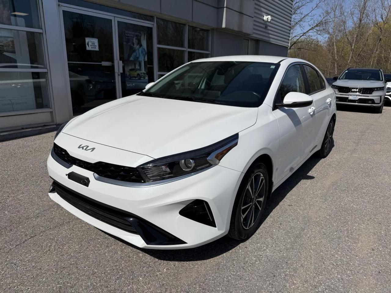 Odometer is 6610 kilometers below market average!  Snow White Pearl 2024 Kia Forte EX FWD  CVT 2.0L I4 MPI DOHC 16V LEV3-SULEV30 147hp ABS brakes, Alloy wheels, Electronic Stability Control, Heated door mirrors, Heated Front Bucket Seats, Heated front seats, Illuminated entry, Low tire pressure warning, Remote keyless entry, Traction control.    **ABOVE IS THE SPECIAL FINANCING PRICE, $1500 MORE FOR CASH PURCHASES** PLEASE CALL AHEAD TO CHECK AVAILABILITY** ** Previous Daily Rental** We believe in a haggle-free environment and provide our best price upfront. We compare our vehicles with competing inventory and adjust our prices daily. At Airport Kia, our team is dedicated to providing exceptional customer service and making your car buying and ownership experience as smooth and enjoyable as possible. From our knowledgeable sales associates who are always ready to help you find the perfect vehicle for your needs and budget, to our expert technicians who are committed to keeping your Kia running smoothly and efficiently, our team is here to meet all of your automotive needs and exceed your expectations. Were proud to be a family-owned dealership, and we treat every customer like family too. That means personalized service tailored to your needs, a warm and welcoming atmosphere, and a commitment to honesty, integrity, and transparency in all of our interactions. So when you choose Airport Kia, you can rest assured that youre in good hands with our team. Visit us today at 3295 Derry Road East, Mississauga, Ontario L4T 1A8 or give us a call at 905-677-5678 to experience the Airport Kia difference for yourself.      **Previous Daily Rental**
