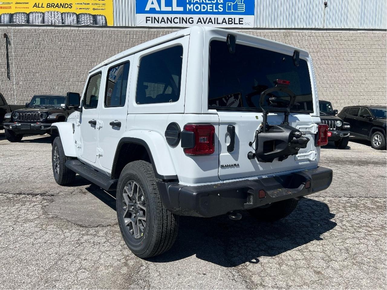 2025 Jeep Wrangler Sahara w/SkyPower Top, Technology, Safety, Steps Photo