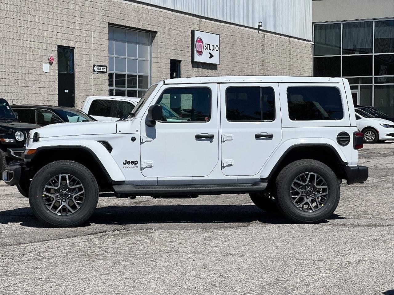2025 Jeep Wrangler Sahara w/SkyPower Top, Technology, Safety, Steps Photo