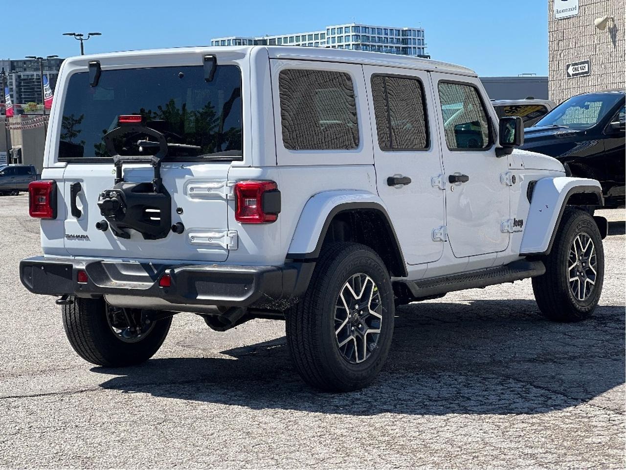 2025 Jeep Wrangler Sahara w/SkyPower Top, Technology, Safety, Steps Photo