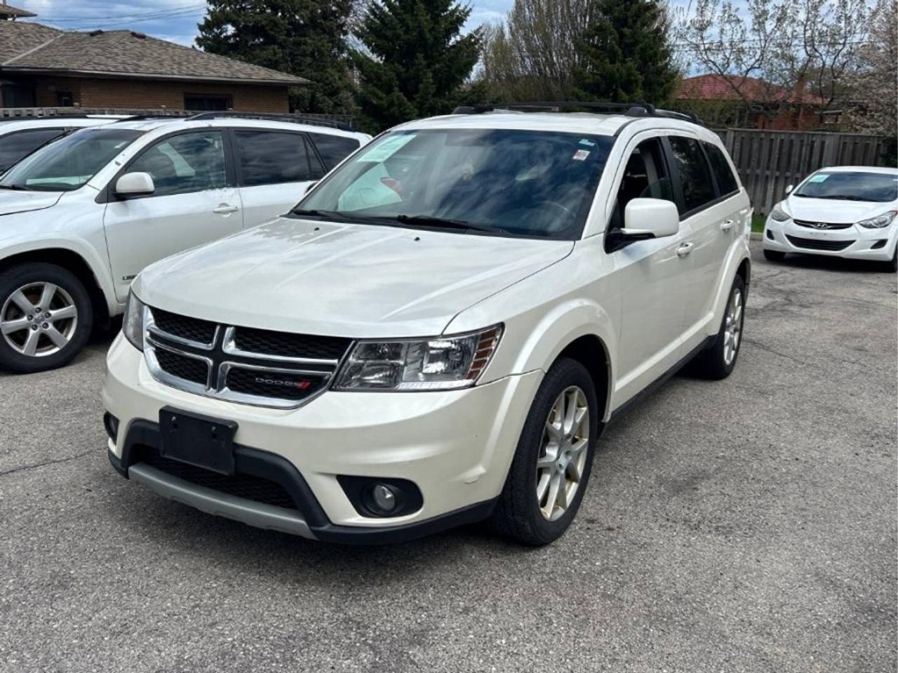 ** ** SPECIAL LIMITED TIME OFFER ** ** PURCHASE ANY VEHICLE THIS WEEK AND RECEIVE 4 BRAND-NEW ALL-SEASON TIRES AT NO ADDITIONAL COST!!! DONT MISS THIS EXCLUSIVE CHANCE TO UPGRADE YOUR RIDE AND STAY PREPARED FOR ANY WEATHER!!!       EXCITING NEWS FROM FIRST CHOICE MOTORS! Our brand-new online showroom is now open to the public, bringing the ultimate car shopping experience right to your fingertips! Enjoy a 100% online car shopping experience, with over 500 certified vehicles in stock, comprehensive protection plans, and thousands of new auto parts & accessories available! Plus, for a limited time, were offering FREE deliveries across Ontario on all vehicle purchases! Dont miss outvisit Shop.fcmotors.ca to find and upgrade your perfect vehicle today!      Welcome to First Choice Motors, the largest car dealership in Toronto of pre-owned cars, SUVs, and vans priced between $5000-$15,000. With an impressive inventory of over 300 vehicles in stock, we are dedicated to providing our customers with a vast selection of affordable and reliable options.       Were thrilled to offer a used 2013 Dodge Journey CREW, white color with 188,000km (STK#9876) This vehicle was $6990 NOW ON SALE FOR $5990. It is equipped with the following features:   - Automatic Transmission   - Heated seats   - Bluetooth   - Reverse camera   - Alloy wheels   - 7 Passenger   - Power windows   - Power locks   - Power mirrors   - Air Conditioning      At First Choice Motors, we believe in providing quality vehicles that our customers can depend on. All our vehicles come with a 36-day guarantee on all safety related items. We also offer additional warranty options up to 5 years for our customers who want extra peace of mind.      Furthermore, all our vehicles are sold fully certified with brand new brakes rotors and pads, a fresh oil change, and brand new set of all-season tires installed & balanced. You can be confident that this car is in excellent condition and ready to hit the road.      At First Choice Motors, we believe that everyone deserves a chance to own a reliable and affordable vehicle. Thats why we offer financing options with low interest rates starting at 7.9% O.A.C. Were proud to approve all customers, including those with bad credit, no credit, students, and even 9 socials. Our finance team is dedicated to finding the best financing option for you and making the car buying process as smooth and stress-free as possible.      Our dealership is open 7 days a week to provide you with the best customer service possible. We carry the largest selection of used vehicles for sale under $9990 in all of Ontario. We stock over 300 cars, mostly Hyundai, Chevrolet, Mazda, Honda, Volkswagen, Toyota, Ford, Dodge, Kia, Mitsubishi, Acura, Lexus, and more. With our ongoing sale, you can find your dream car at a price you can afford. Come visit us today and experience why we are the best choice for your next used car purchase!      All prices include $22.00 OMVIC Fee.  Excludes, license plates, ownership registration and ONTARIO HST (13%)   *No Credit Card payments can be accepted for Vehicle Purchases*    *No Credit Card payments can be accepted for Vehicle Purchases*