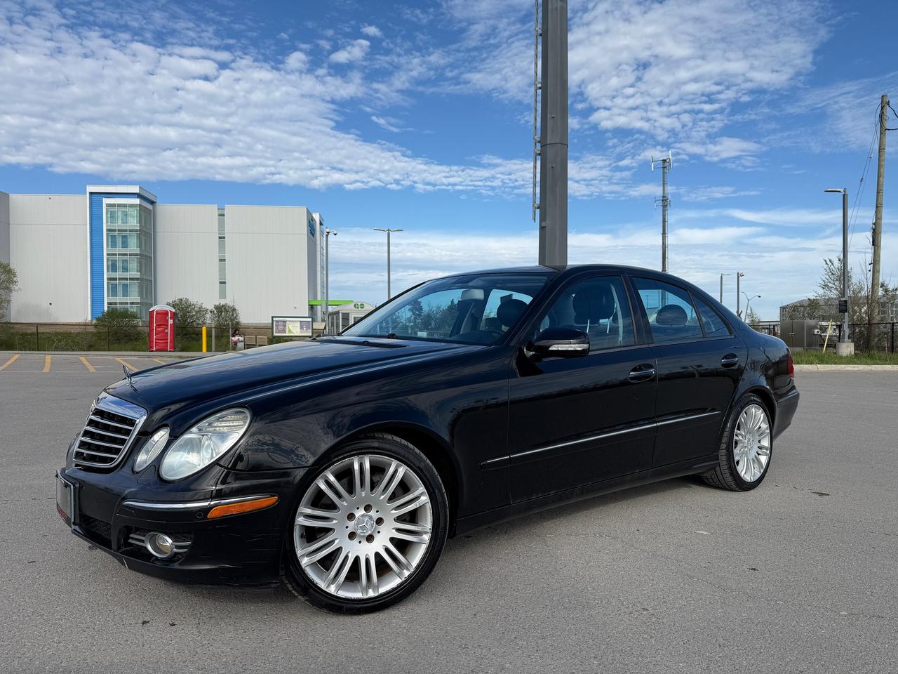 <p>Discover the refined elegance and timeless performance of this 2008 Mercedes-Benz E-Class 3.5L, now available at Select Auto Centre Ltd. Presented in a sophisticated black exterior with a matching black interior, this sedan exudes a classic luxury that&rsquo;s instantly recognizable. Under the hood, a powerful 6-cylinder engine paired with an automatic transmission and all-wheel drive ensures a smooth, confident, and capable driving experience, no matter the road conditions. This is a fantastic opportunity to own a piece of Mercedes-Benz engineering.</p><p>With a mileage of 238,003 km, this E-Class has been a trusted companion on many journeys, ready to continue its legacy with its next owner. Its four-door sedan configuration offers practicality and comfort for passengers, while the overall design speaks volumes about its premium heritage. For those seeking an introduction to the Mercedes-Benz driving experience, this E-Class represents a compelling choice, offering a blend of comfort, performance, and style.</p><p>Here are five of the most captivating features of this 2008 Mercedes-Benz E-Class:</p><ul><li><strong>All-Wheel Drive:</strong> Conquer Canadian weather with confidence thanks to the advanced all-wheel-drive system, providing superior traction and stability in rain, snow, or ice.</li><li><strong>Powerful 3.5L 6-Cylinder Engine:</strong> Experience the signature Mercedes-Benz performance, delivering smooth acceleration and ample power for both city commutes and highway cruising.</li><li><strong>Luxurious Black on Black Interior:</strong> Immerse yourself in an environment of understated elegance, with a sleek black interior that complements the exterior for a sophisticated aesthetic.</li><li><strong>Timeless Sedan Design:</strong> The iconic E-Class silhouette offers a classic and distinguished look that remains stylish and desirable, representing enduring automotive artistry.</li><li><strong>Automatic Transmission:</strong> Enjoy effortless driving with the smooth and responsive automatic transmission, designed for optimal comfort and ease of operation.</li></ul><p><strong><em>Powered by AutoIntelligence&trade;</em></strong></p><p>Vehicle information has been generated using artificial intelligence and is provided for informational purposes only. While efforts are made to ensure accuracy, please confirm all details directly with the dealer.</p>