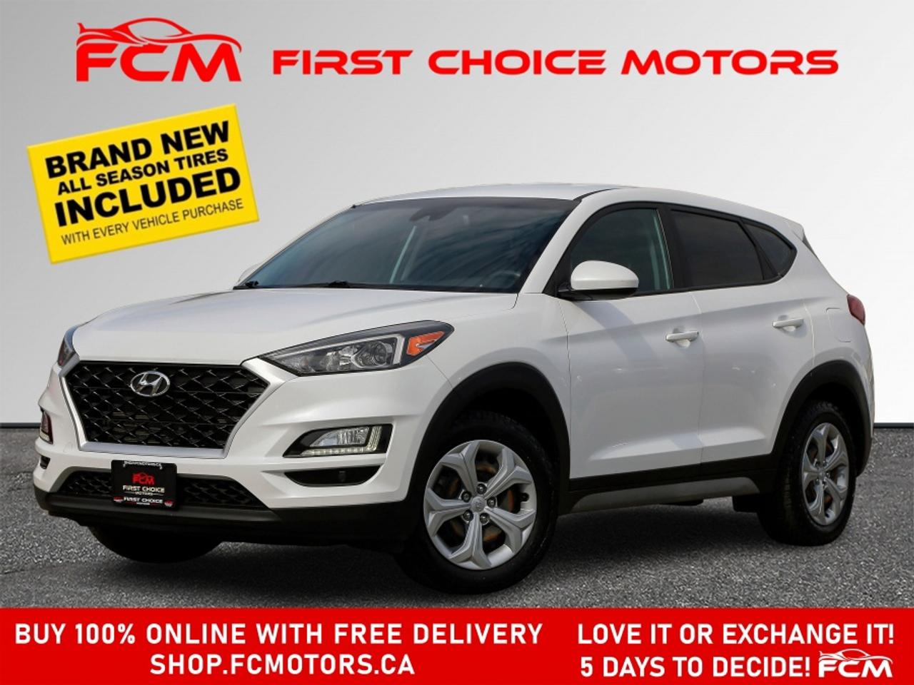 ** ** SPECIAL LIMITED TIME OFFER ** ** PURCHASE ANY VEHICLE THIS WEEK AND RECEIVE 4 BRAND-NEW ALL-SEASON TIRES AT NO ADDITIONAL COST!!! DON   T MISS THIS EXCLUSIVE CHANCE TO UPGRADE YOUR RIDE AND STAY PREPARED FOR ANY WEATHER!!! <br><br>EXCITING NEWS FROM FIRST CHOICE MOTORS! Our brand-new online showroom is now open to the public, bringing the ultimate car shopping experience right to your fingertips! Enjoy a 100% online car shopping experience, with over 500 certified vehicles in stock, comprehensive protection plans, and thousands of new auto parts & accessories available! Plus, for a limited time, were offering FREE deliveries across Ontario on all vehicle purchases! Dont miss out   visit Shop.fcmotors.ca to find and upgrade your perfect vehicle today!<br><br>Welcome to First Choice Motors, the largest car dealership in Toronto of pre-owned cars, SUVs, and vans priced between $5000-$15,000. With an impressive inventory of over 300 vehicles in stock, we are dedicated to providing our customers with a vast selection of affordable and reliable options. <br><br>Were thrilled to offer a used 2021 Hyundai Tucson ESSENTIAL, white color with 130,000km (STK#9902) This vehicle was $18490 NOW ON SALE FOR $16990. It is equipped with the following features:<br>- Automatic Transmission<br>- Heated seats<br>- All wheel drive<br>- Bluetooth<br>- Apple CarPlay<br>- Reverse camera<br>- Power windows<br>- Power locks<br>- Power mirrors<br>- Air Conditioning<br><br>At First Choice Motors, we believe in providing quality vehicles that our customers can depend on. All our vehicles come with a 36-day guarantee on all safety related items. We also offer additional warranty options up to 5 years for our customers who want extra peace of mind.<br><br>Furthermore, all our vehicles are sold fully certified with brand new brakes rotors and pads, a fresh oil change, and brand new set of all-season tires installed & balanced. You can be confident that this car is in excellent condition and ready to hit the road.<br><br>At First Choice Motors, we believe that everyone deserves a chance to own a reliable and affordable vehicle. Thats why we offer financing options with low interest rates starting at 7.9% O.A.C. Were proud to approve all customers, including those with bad credit, no credit, students, and even 9 socials. Our finance team is dedicated to finding the best financing option for you and making the car buying process as smooth and stress-free as possible.<br><br>Our dealership is open 7 days a week to provide you with the best customer service possible. We carry the largest selection of used vehicles for sale under $9990 in all of Ontario. We stock over 300 cars, mostly Hyundai, Chevrolet, Mazda, Honda, Volkswagen, Toyota, Ford, Dodge, Kia, Mitsubishi, Acura, Lexus, and more. With our ongoing sale, you can find your dream car at a price you can afford. Come visit us today and experience why we are the best choice for your next used car purchase!<br><br>All prices include $22.00 OMVIC Fee.  Excludes, license plates, ownership registration and ONTARIO HST (13%)<br>*No Credit Card payments can be accepted for Vehicle Purchases*