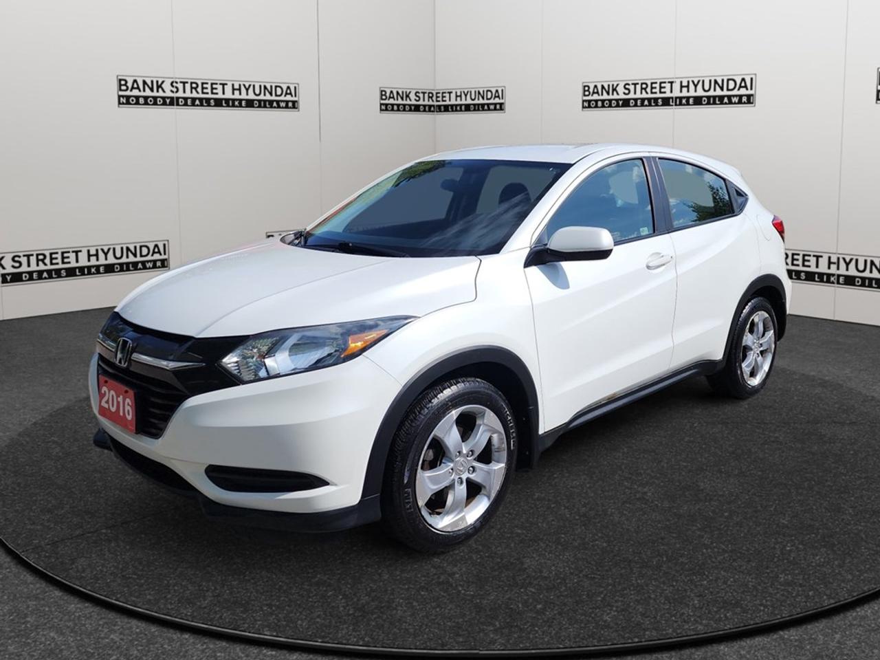 Experience the 2016 Honda HR-V LX with its refined Modern Steel Metallic exterior and nimble front-wheel drive. This versatile SUV is designed for driving enthusiasts who appreciate smooth handling on city roads and open highways alike. The HR-Vs exterior features attractive alloy wheels that provide a touch of class and enhance its dynamic profile. Step inside the cozy interior, where youll find thoughtful styling details and essential features such as heated front seatsperfect for those chilly Canadian mornings. The spacious cabin accommodates both passengers and cargo comfortably, thanks to the folding rear seats and generous headroom. Keep connected and entertained during every drive with Bluetooth technology and smart device integration. The backup camera assists with parking ease, while the heated mirrors ensure clarity in all weather conditions. Keyless entry adds a touch of convenience, and the reliable cruise control allows for a relaxed, enjoyable driving experience. In terms of safety, the brake assist feature provides that extra layer of security for peace of mind. Ideal for urban commuters, small families, or anyone seeking a reliable and versatile vehicle, the 2016 Honda HR-V LX is a smart choice. Contact us today for more information or to schedule a test drivediscover how this SUV can be the perfect addition to your lifestyle.