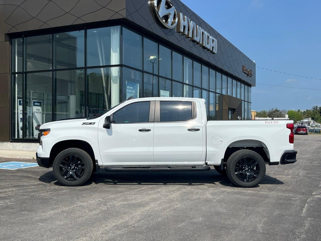 2024 Chevrolet Silverado 1500 Crew Cab Short Box 4-Wheel Drive Custom Trail Boss Photo